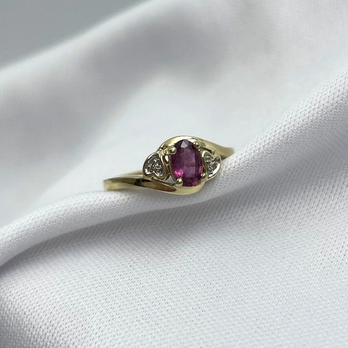 3/4 view with white background Ruby And Diamond Double Heart Ladies Ring 10k Yellow Gold