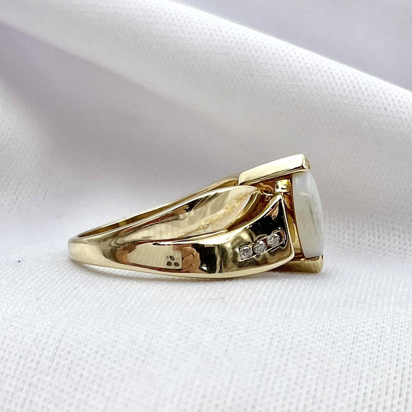 side view white background 10k Yellow Gold Marquise Cut Opal With Diamond Accents Ladies Ring