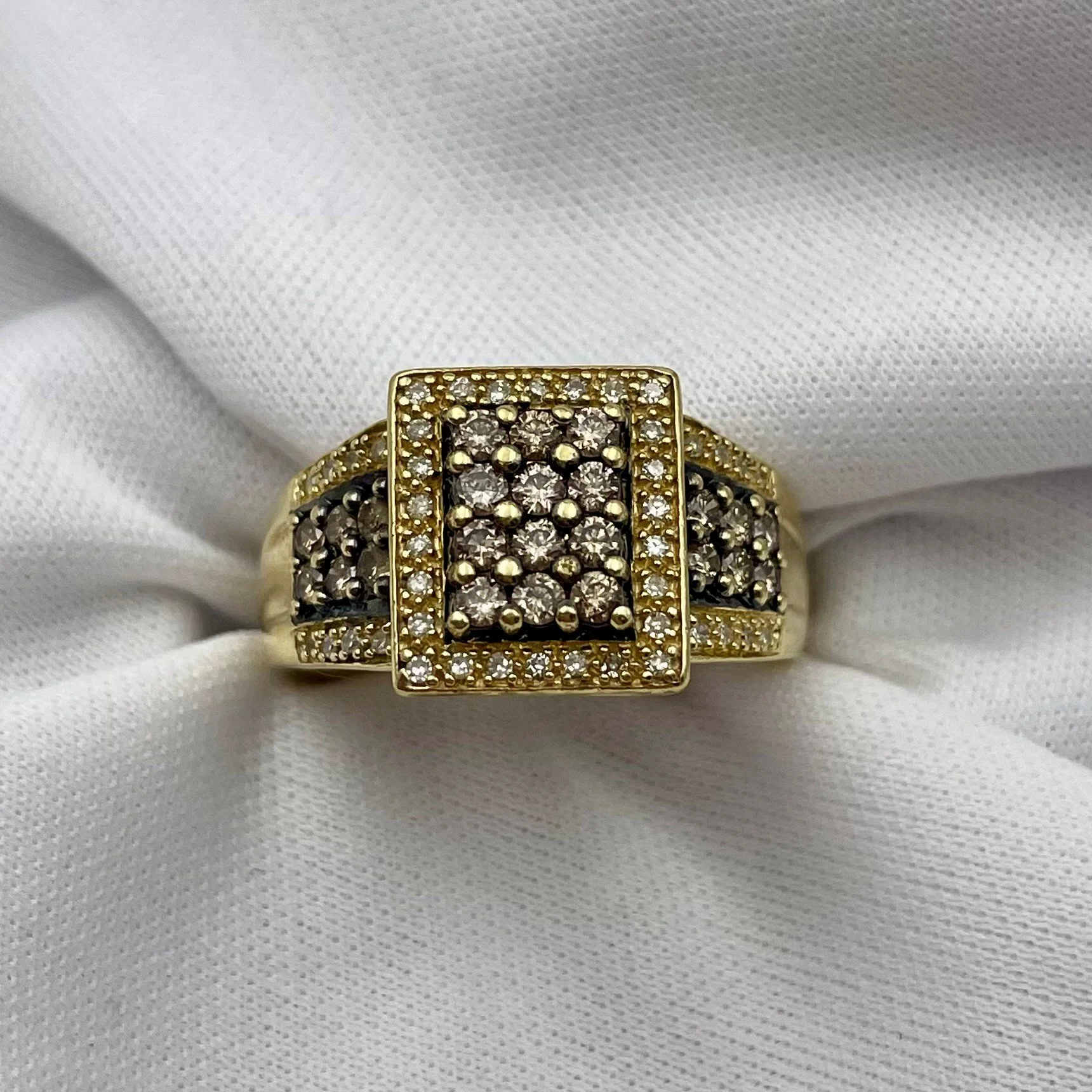 top down view of 1/2ctw Ladies Fancy Chocolate and White Diamond Statement Ring white cloth background