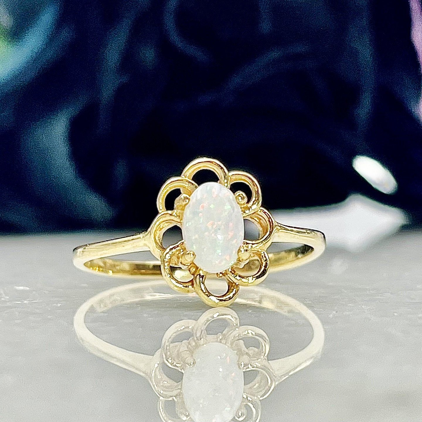 Ladies Oval Opal Ring Floral Detailing 10k Yellow Gold