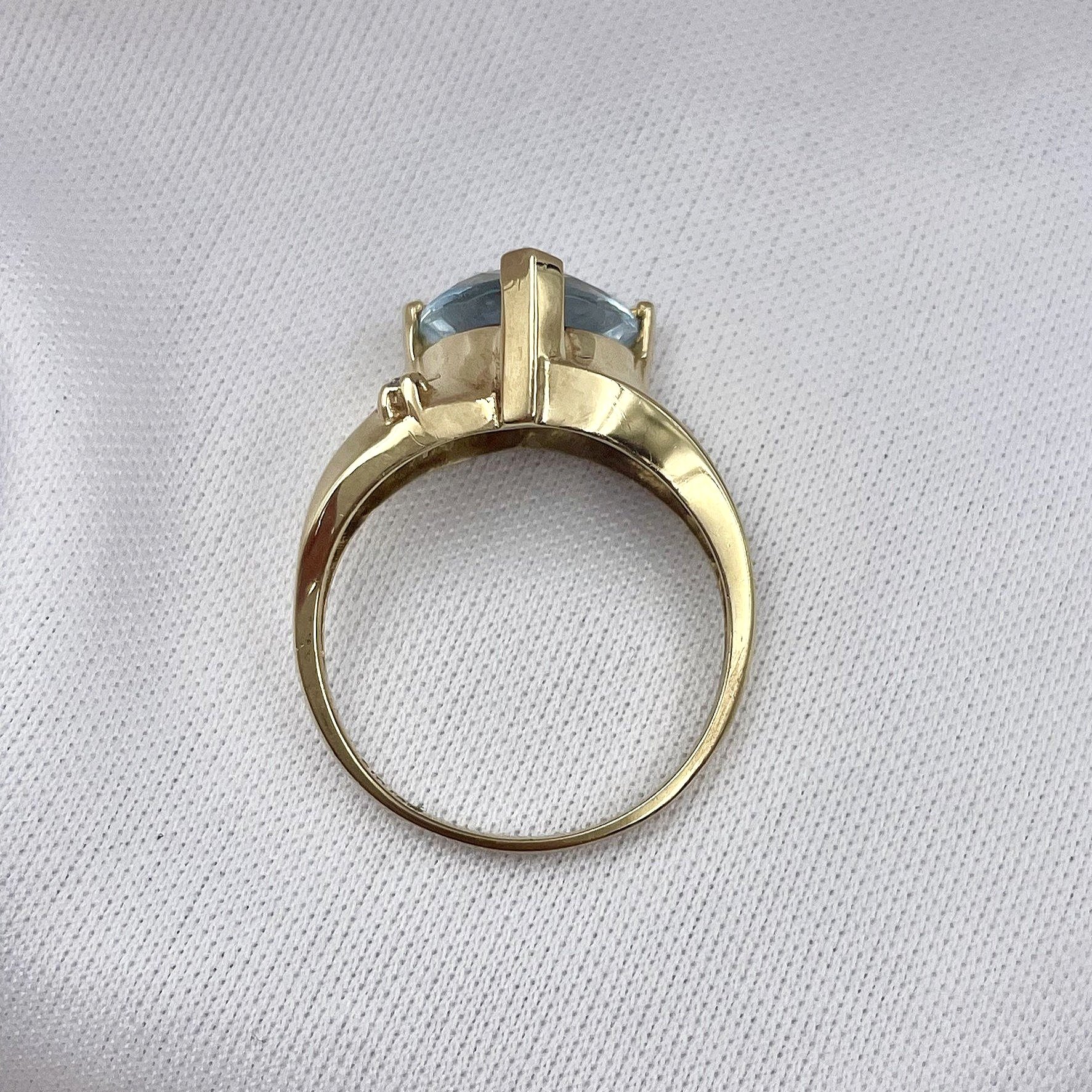 top down gallery view white background Trillion Cut Blue Topaz With Diamond Accents Ladies 10k Yellow Gold Ring