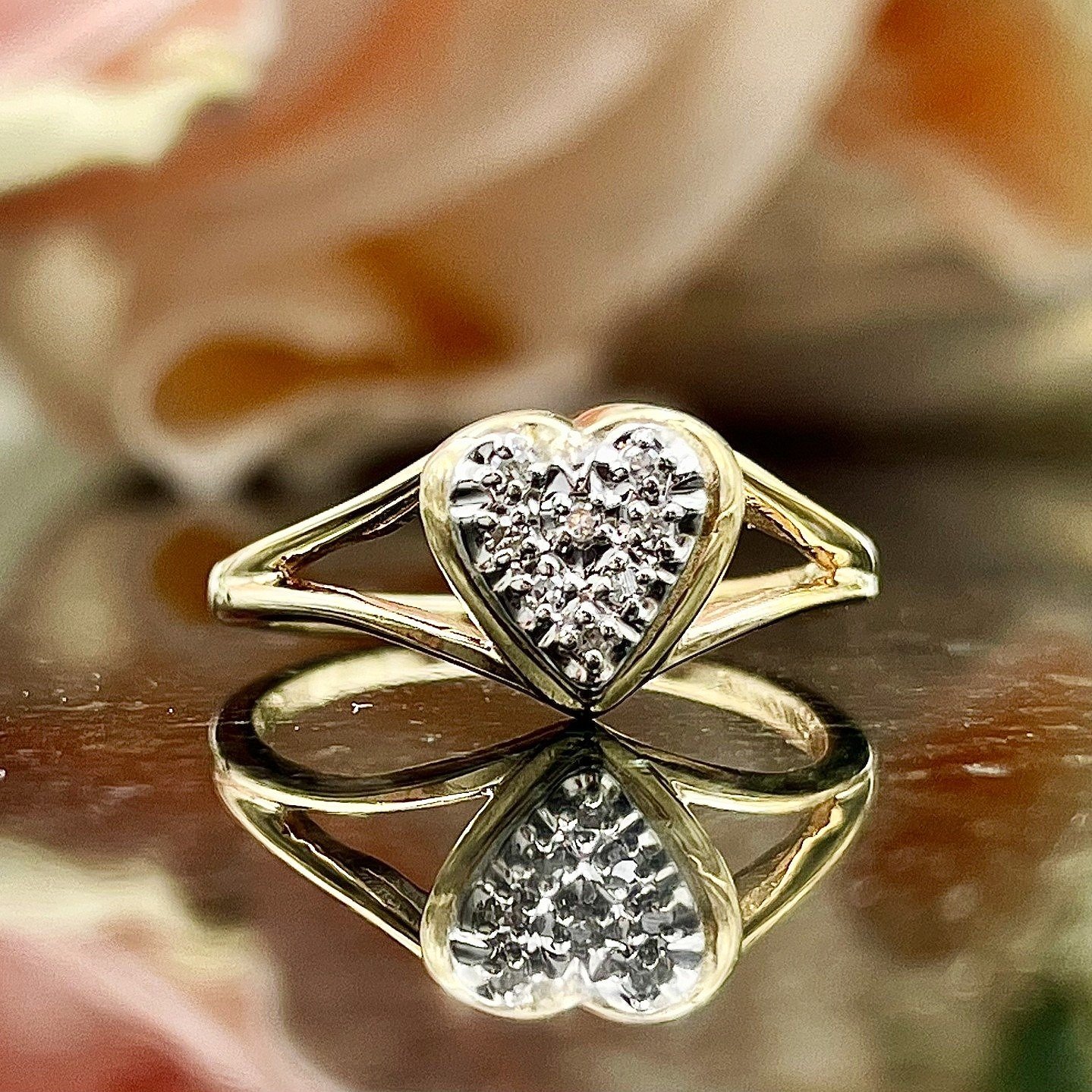 close up in front of flowers 10k Yellow Gold Diamond Heart Cluster Promise Ring Fashion Ring