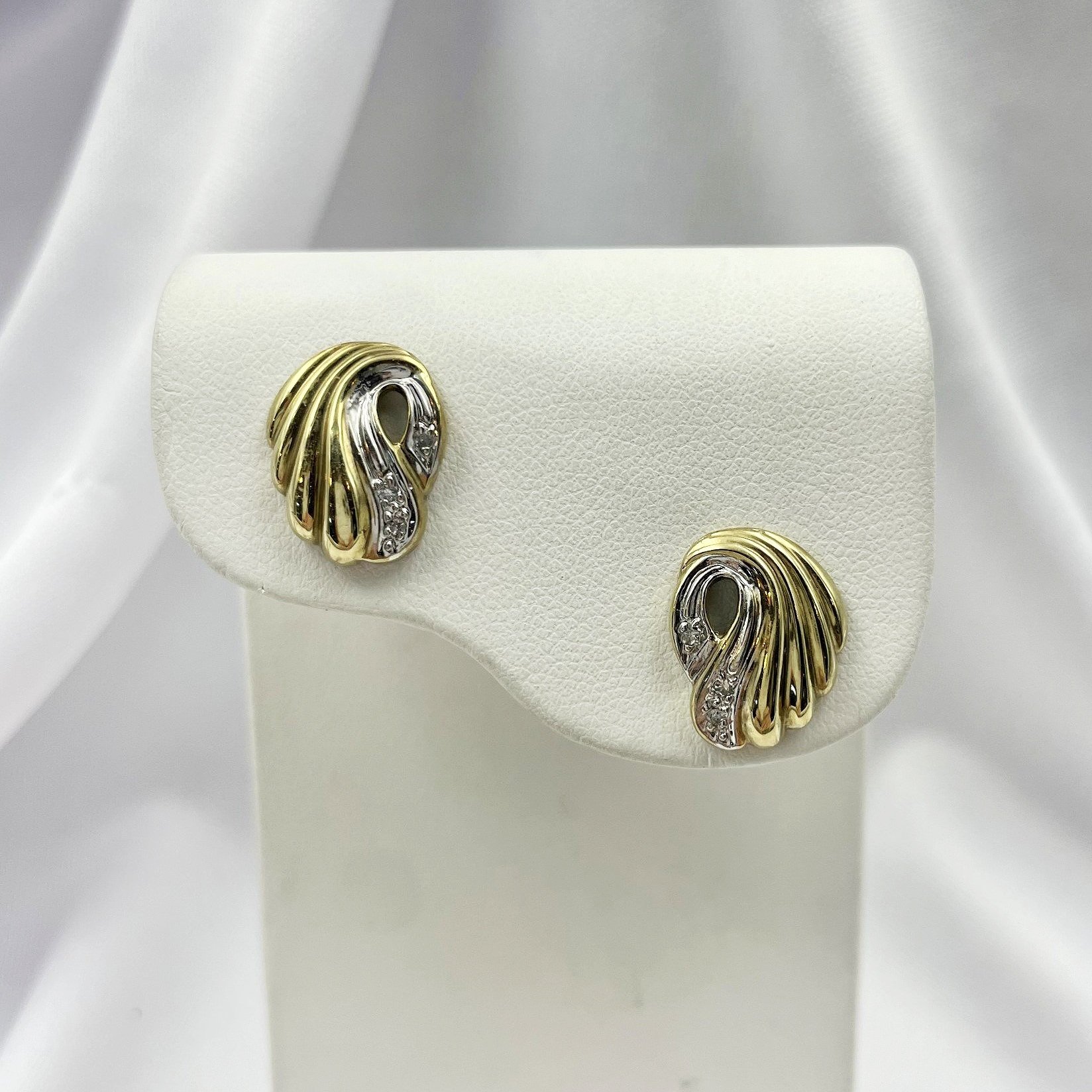 close up white background Fancy Swirl Diamond Earrings 14k Yellow Gold