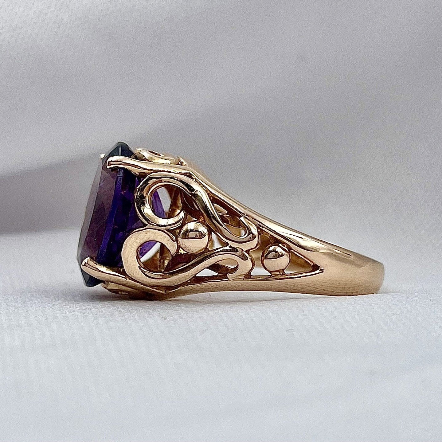 side view white background 14k Rose Gold Heart Filigree Oval Amethyst Ladies Ring