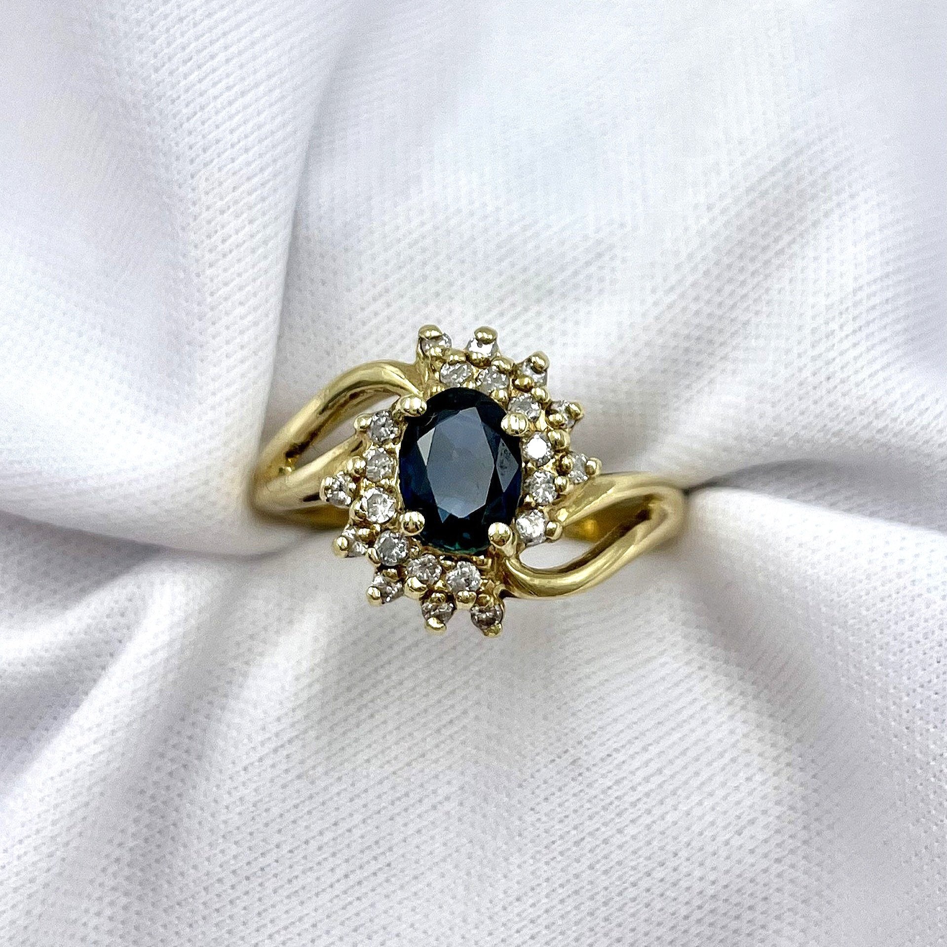 top down white background Floral 10k Yellow Gold Oval Sapphire With Diamond Accents Ladies Ring