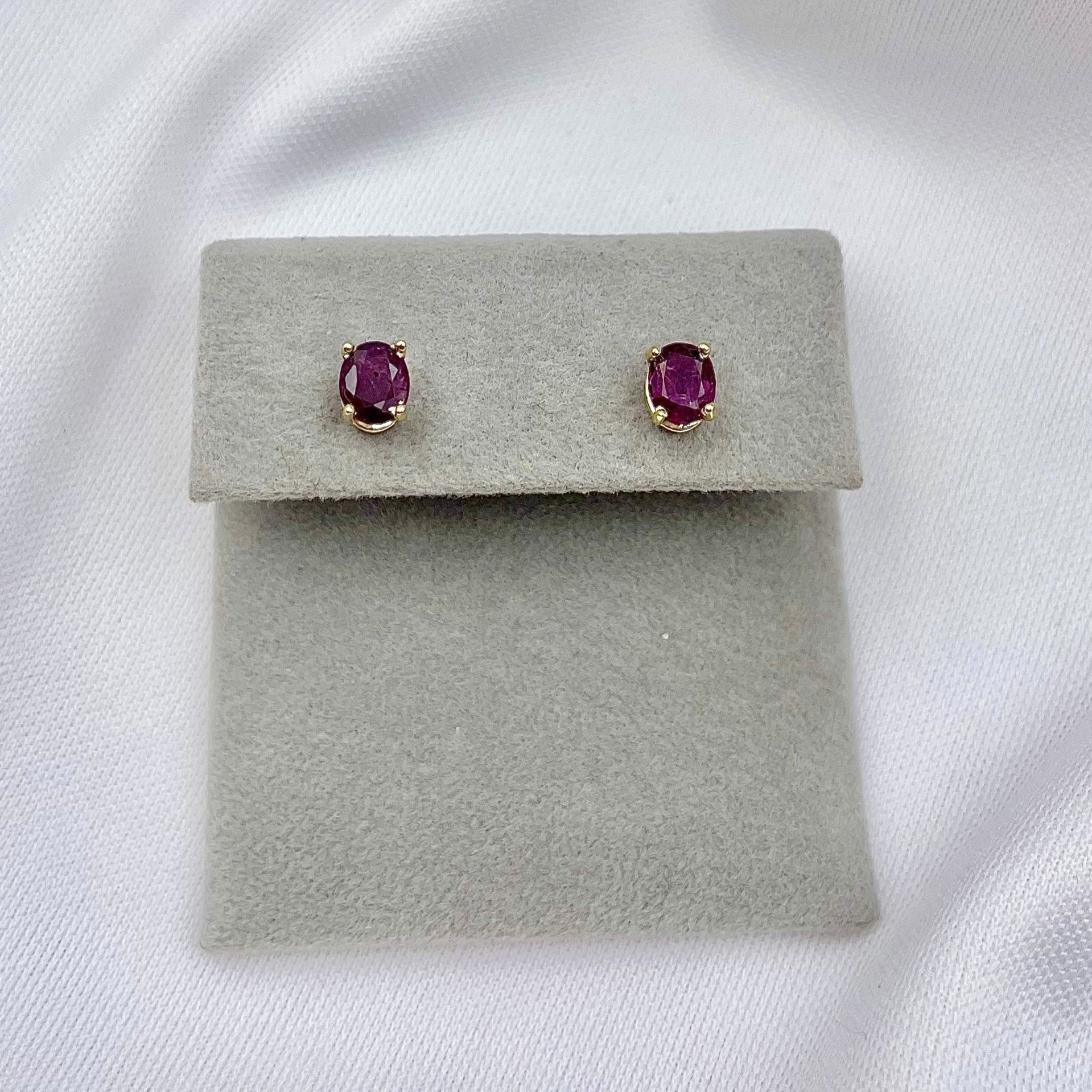 top down view white background .92ctw Oval Ruby Solitaire Studs 14k Yellow Gold