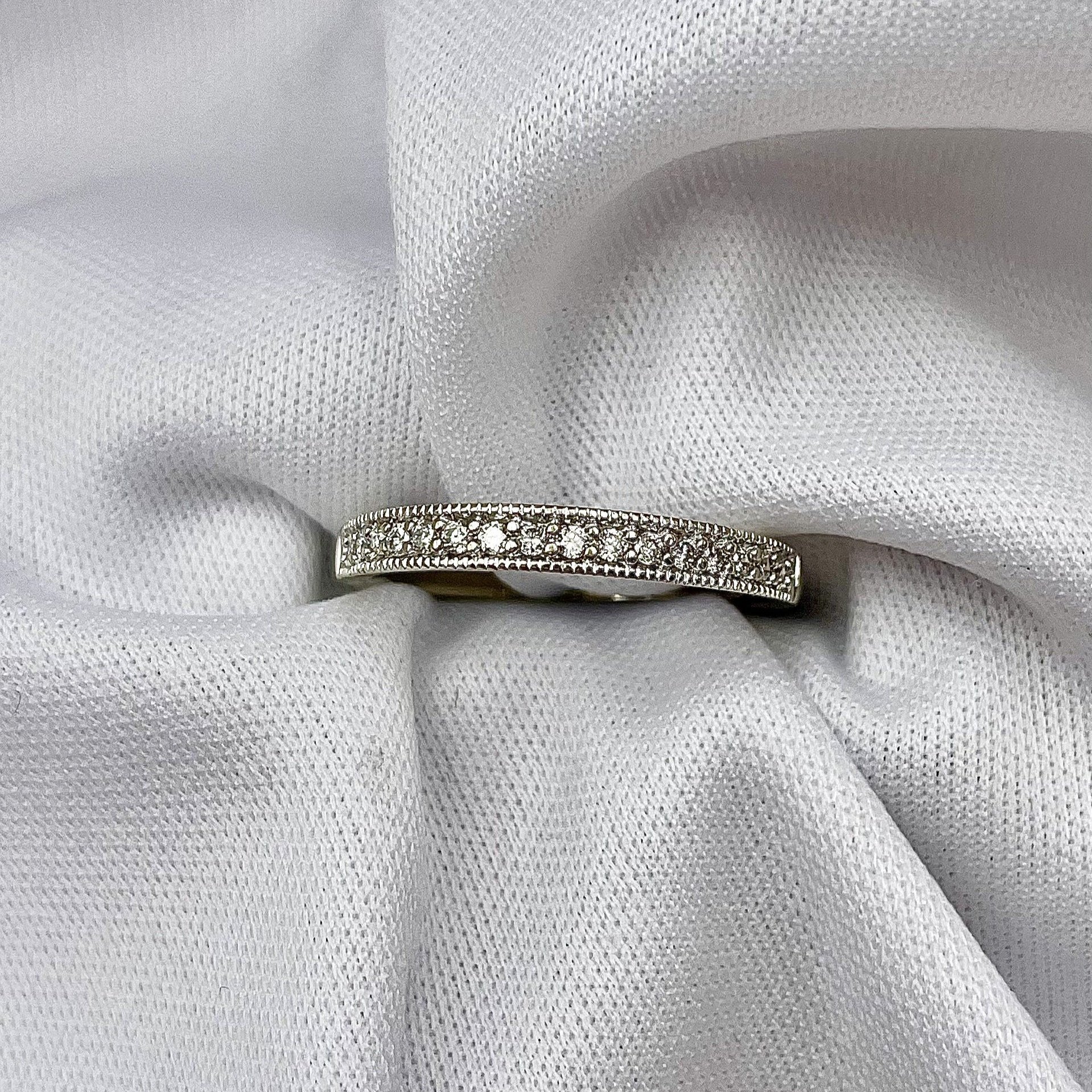 top down view white background .15ctw A+ Diamond Band Faux Channel With Milgrain 14k White Gold