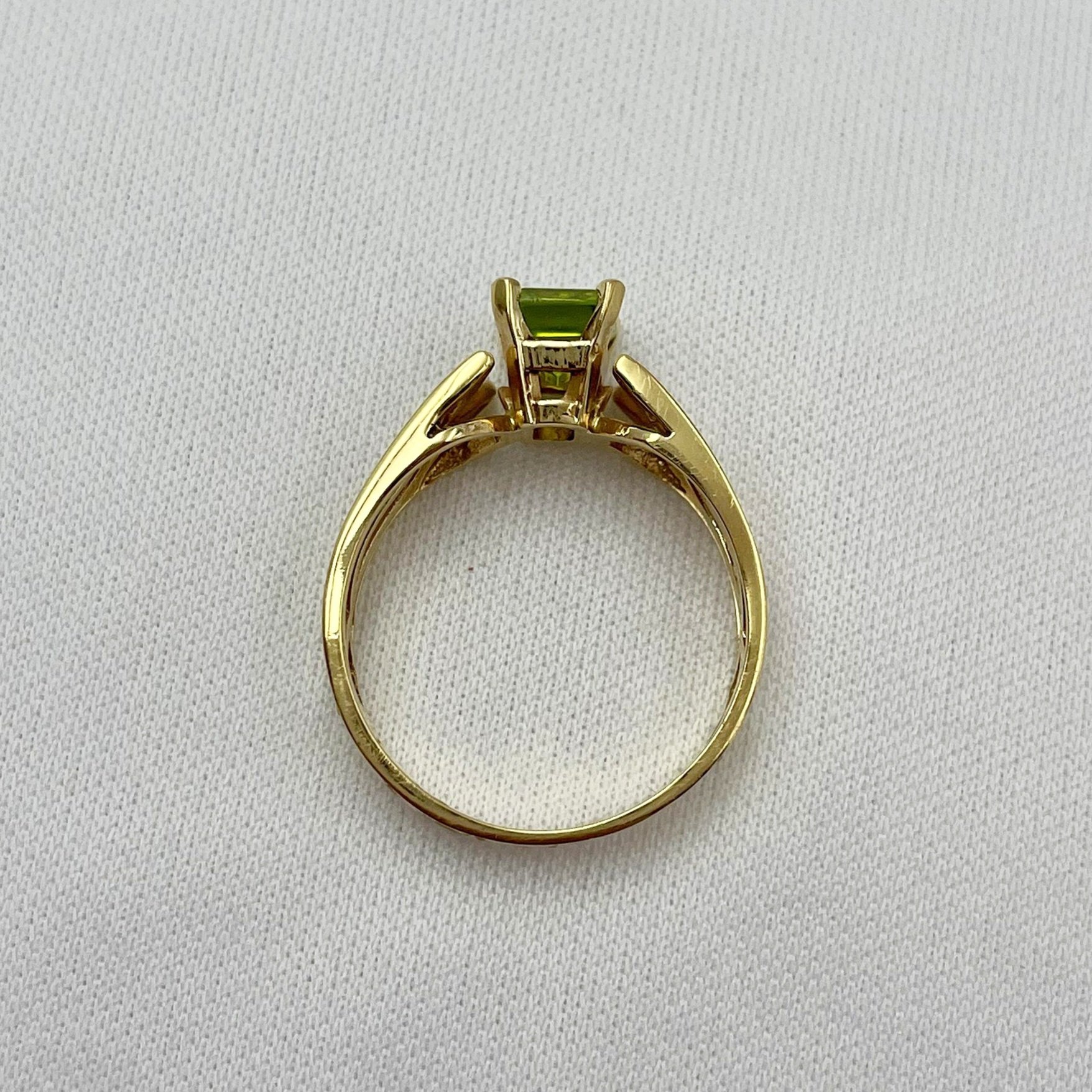 top down gallery view white background Peridot Emerald Cut Celtic Knot Inspired 14k Yellow Gold Ring