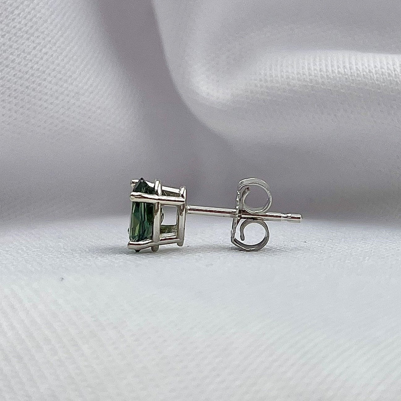 side view white background 1.06ctw 6x4mm Oval Blue Green Sapphire Solitaire Studs 14k White Gold