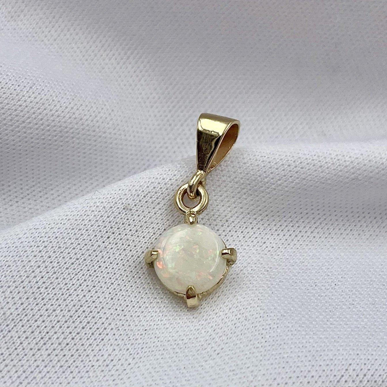 close up white background 14k Yellow Gold Pear Cut Opal With Diamond Accent Drop Pendant