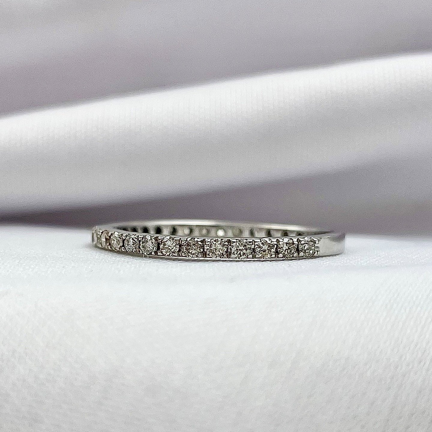 side view white background .14ctw A Diamonds Shared Prong 3/4ths Eternity Band 10k White Gold