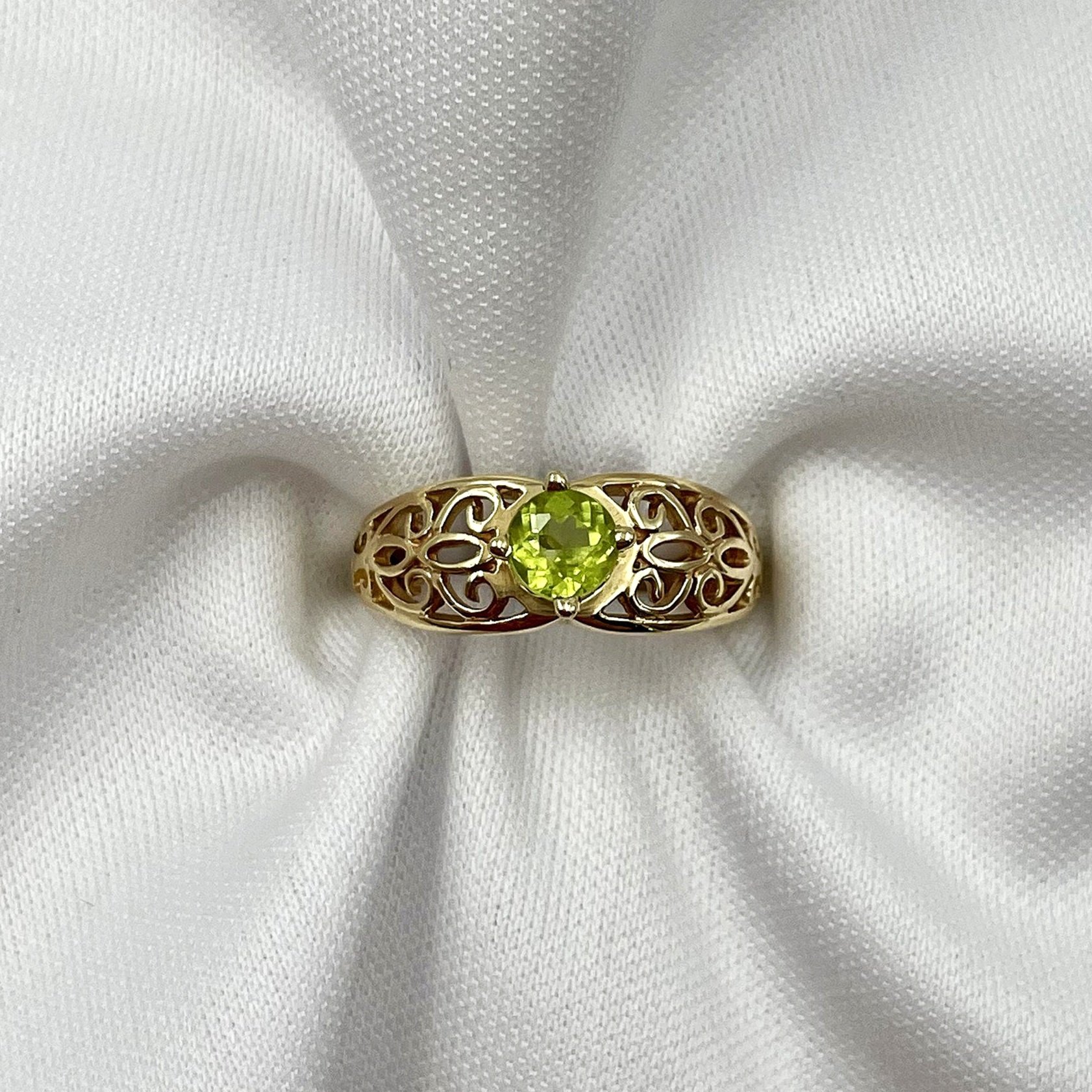 Peridot Filigree Solitaire 14k Yellow Gold Ladies Fashion Ring top down with a white background