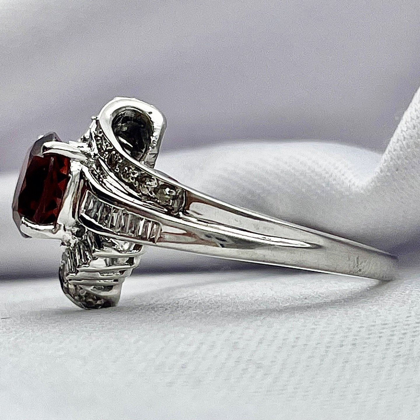 side view white background 10k White Gold 7.0mm Garnet With Diamond Accents Faux Bypass Style Ring