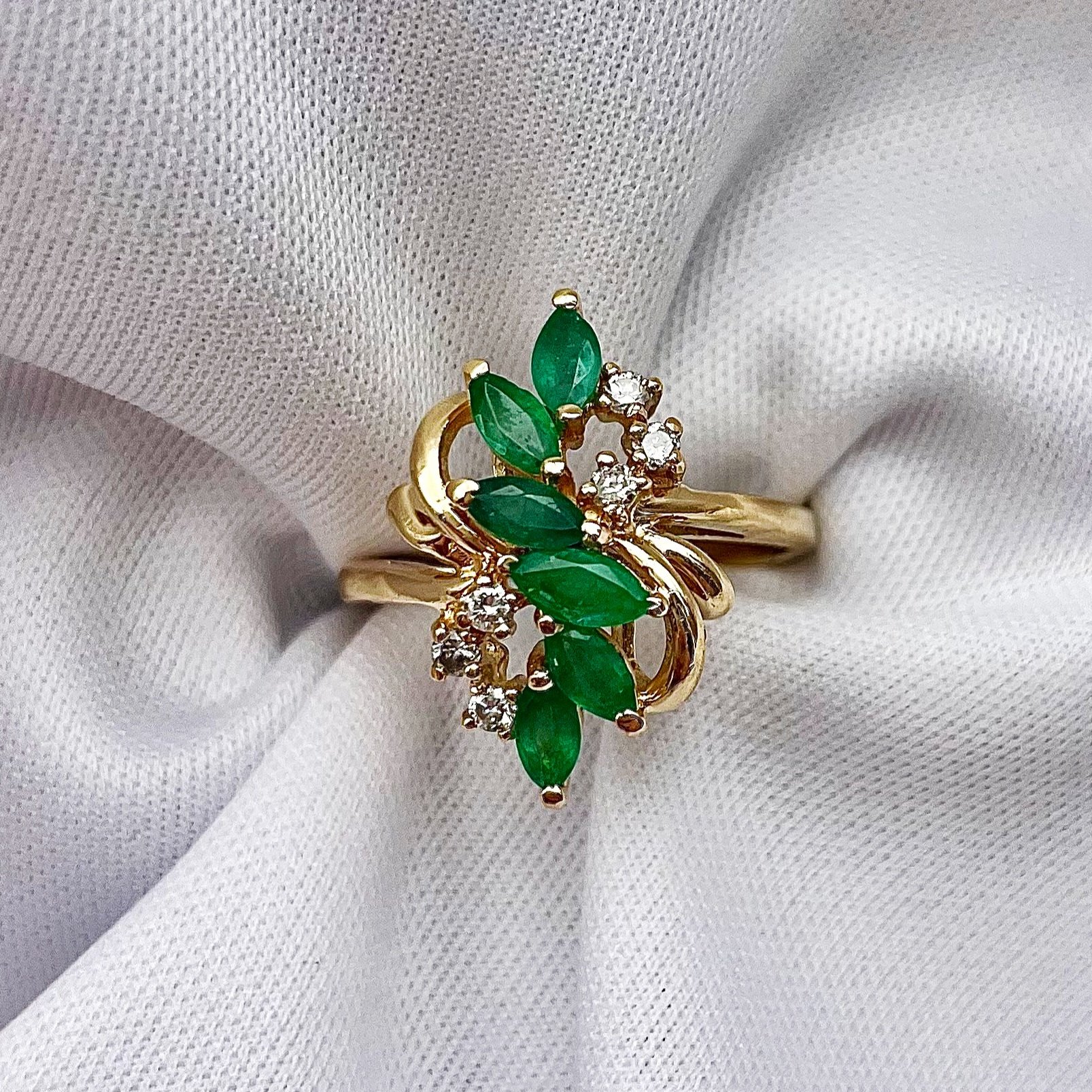 top down white background Marquise Cut Emerald With Diamond Accents Vintage Inspired Statement Ring 14k Yellow Gold