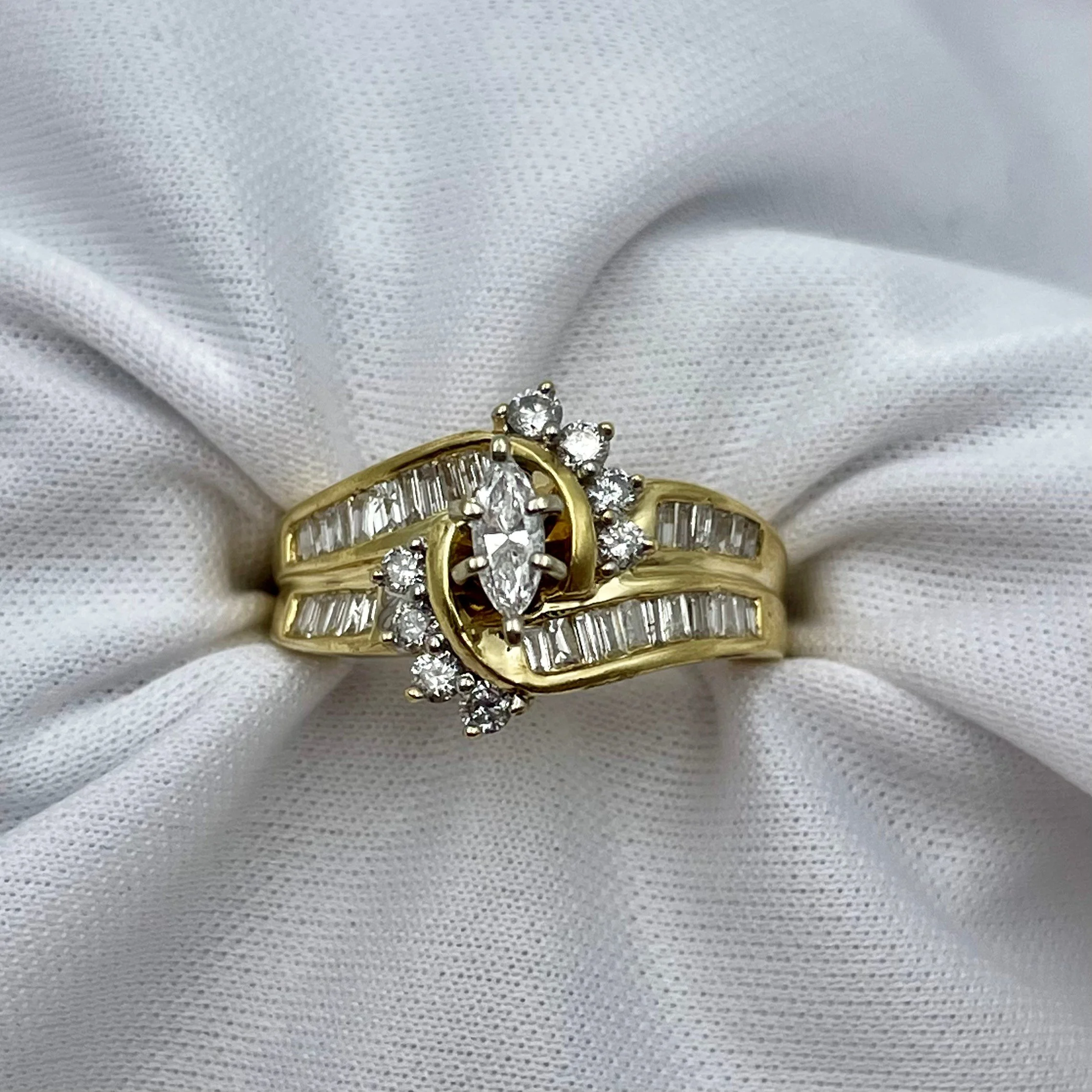 top down view of 1.00ctw Marquise Diamond Statement Ring Engagement Anniversary 14k Yellow Gold white cloth background