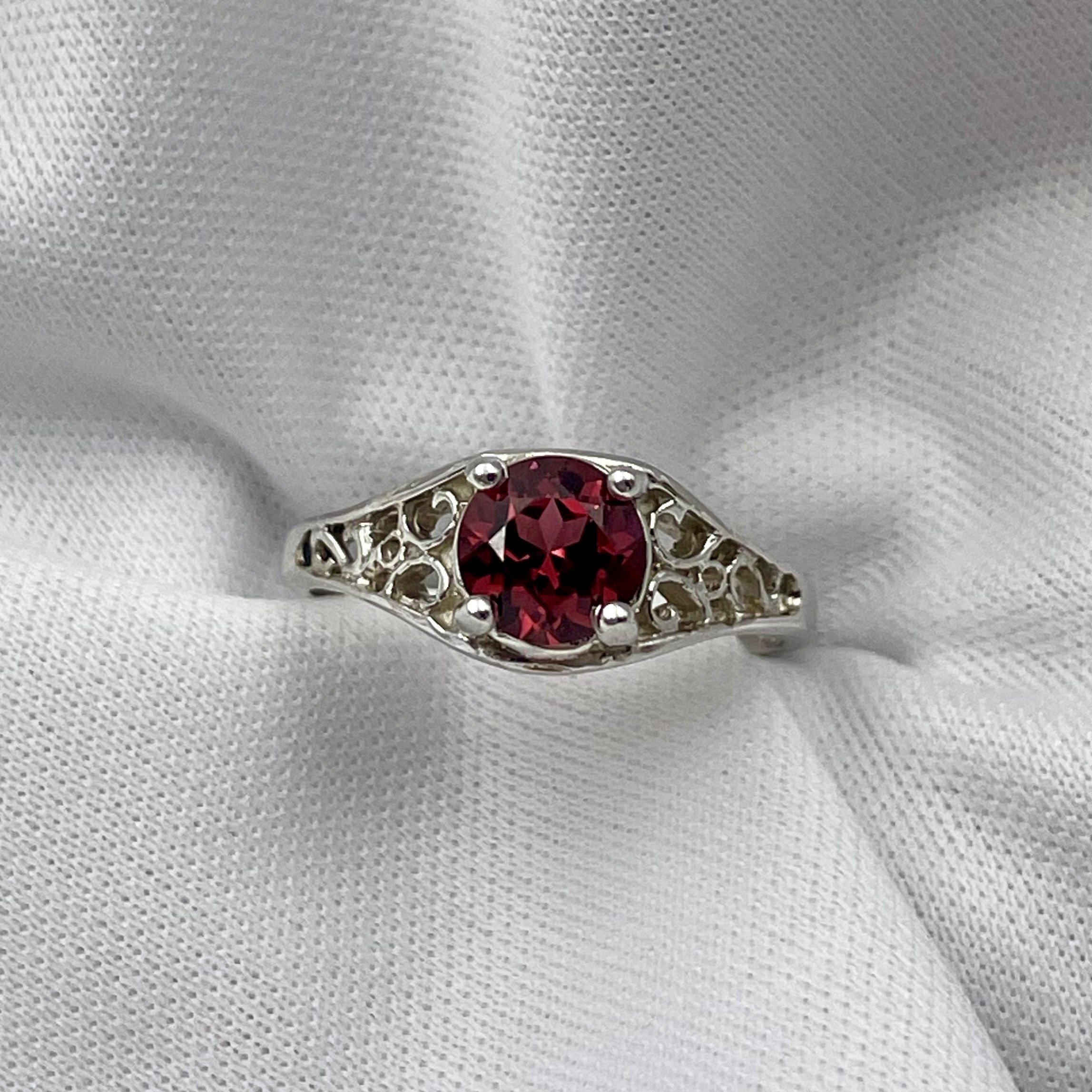 top down front view 14k White Gold 6mm Round Garnet Ladies Rings With Filigree Shoulders in front of white background