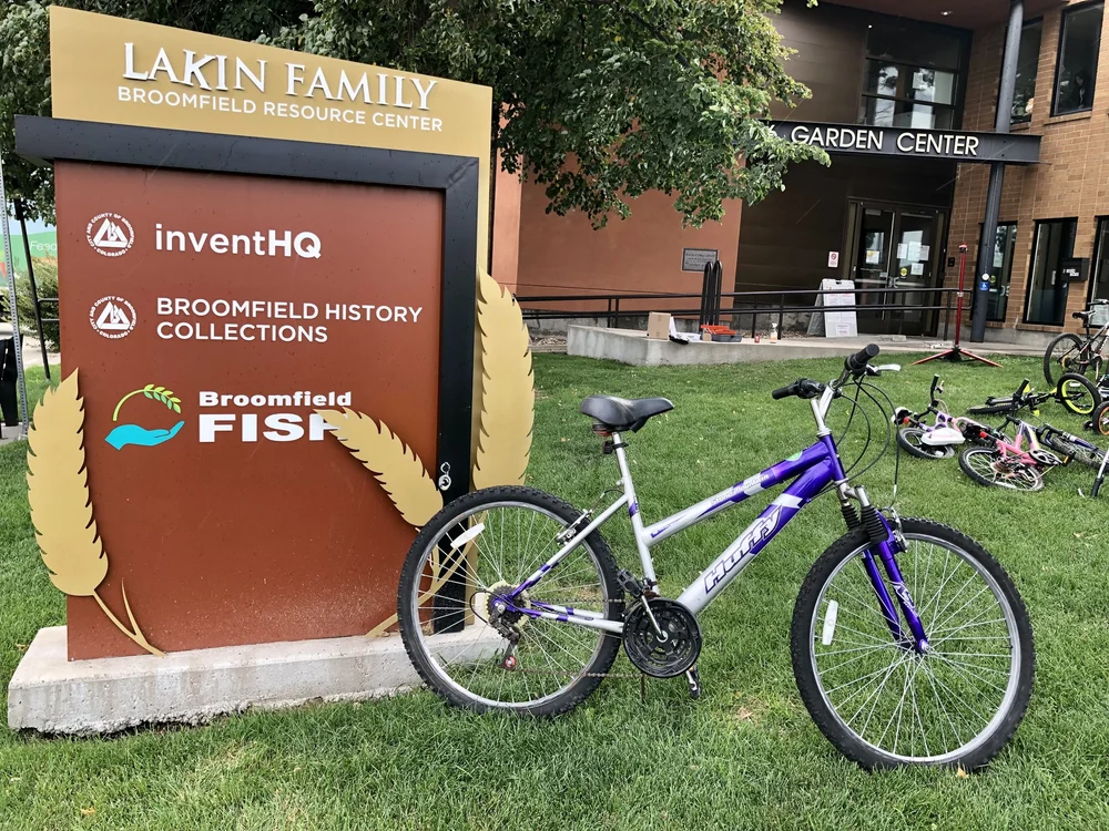 Volunteers and recipients at the Ride Broomfield and Broomfield FISH bike giveaway