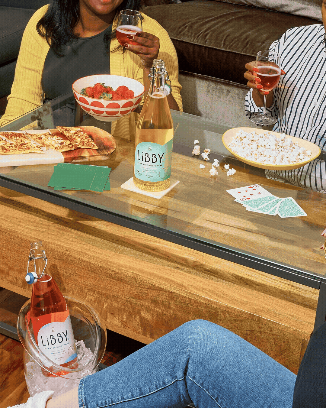Group of people toasting at glass table with LiBBY non-alcoholic beverages and snacks, lifestyle beverage stop motion GIF by Golden Joy Photography in Los Angeles