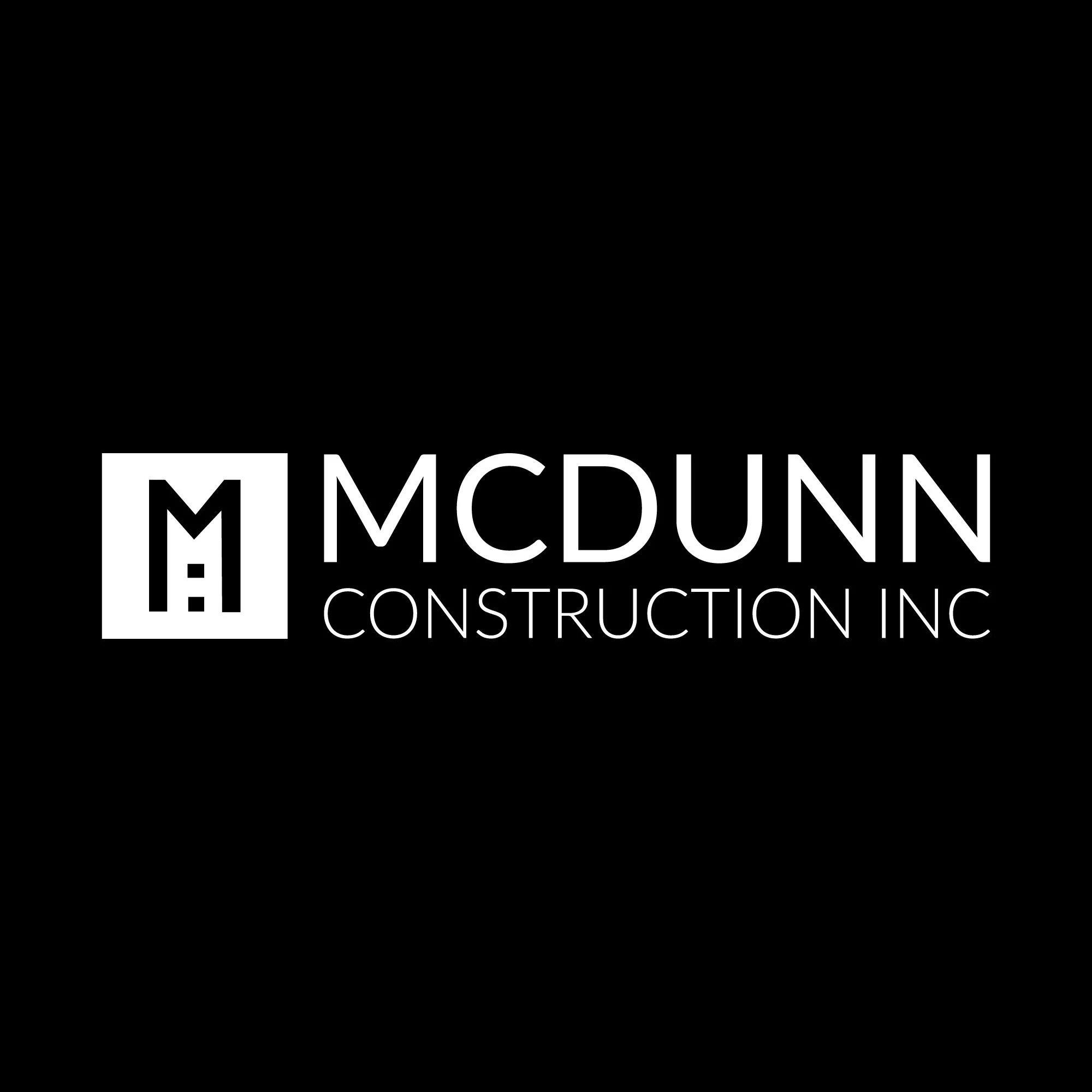mcdunn logo white on black.jpg