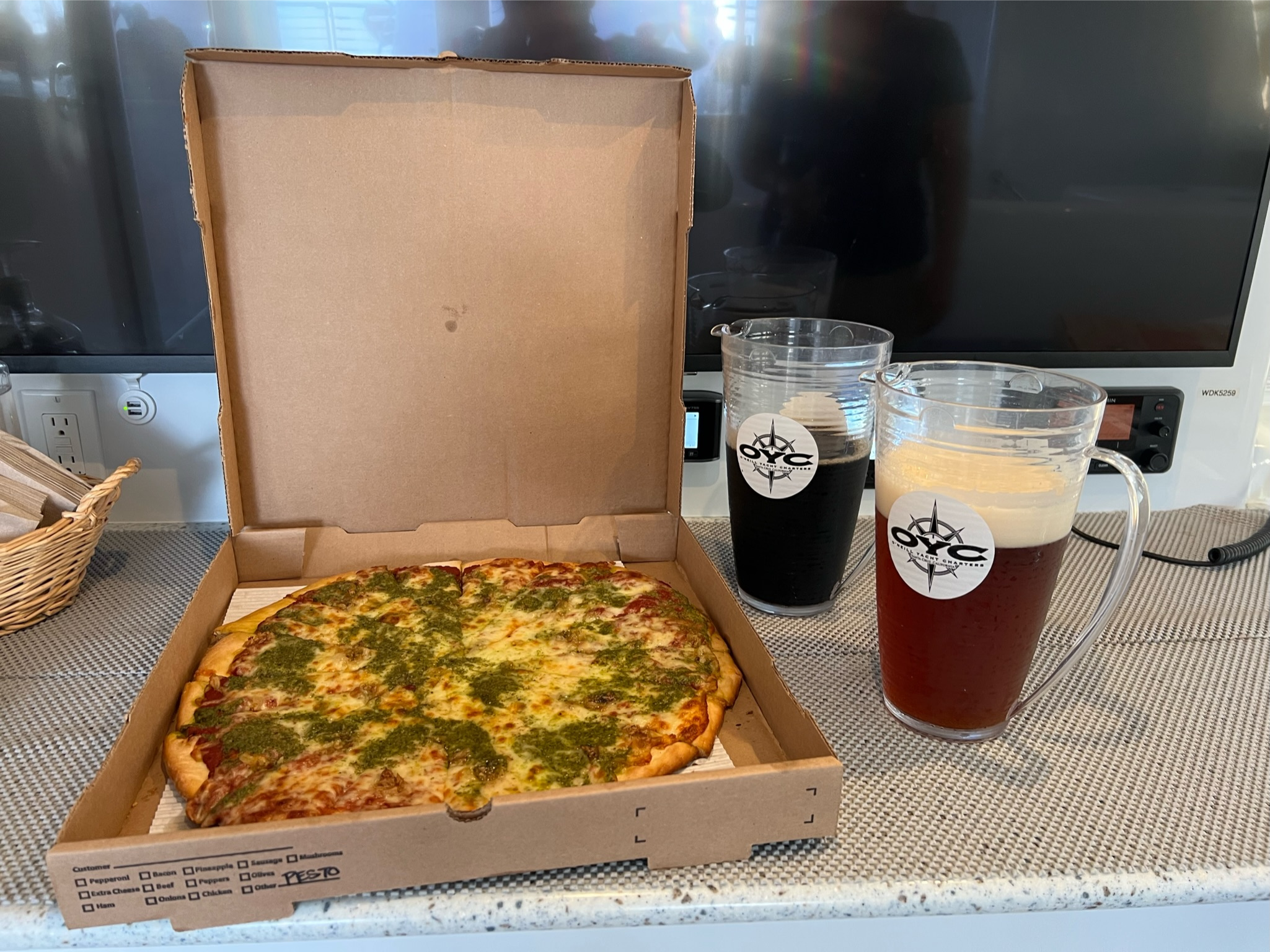 Pizza & beer from a local Santa Cruz brewery are on display for passengers to indulge in, these complementary options available during Local Beer Sampling or Wine Tasting sails with options during daytime or sunset