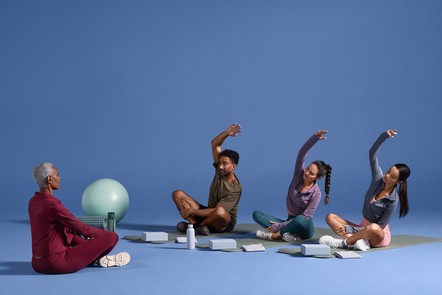 Woman coaching group fitness class
