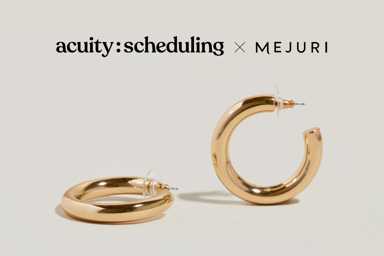 Acuity Scheduling and Mejuri logos above gold earrings