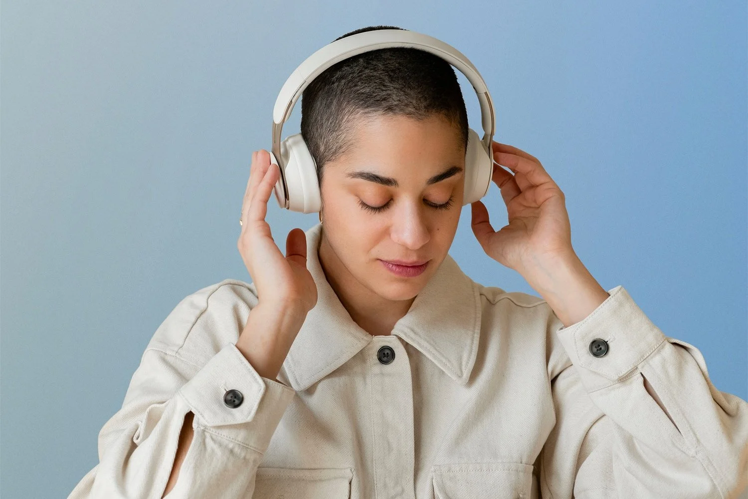 Woman listening to music with headphones