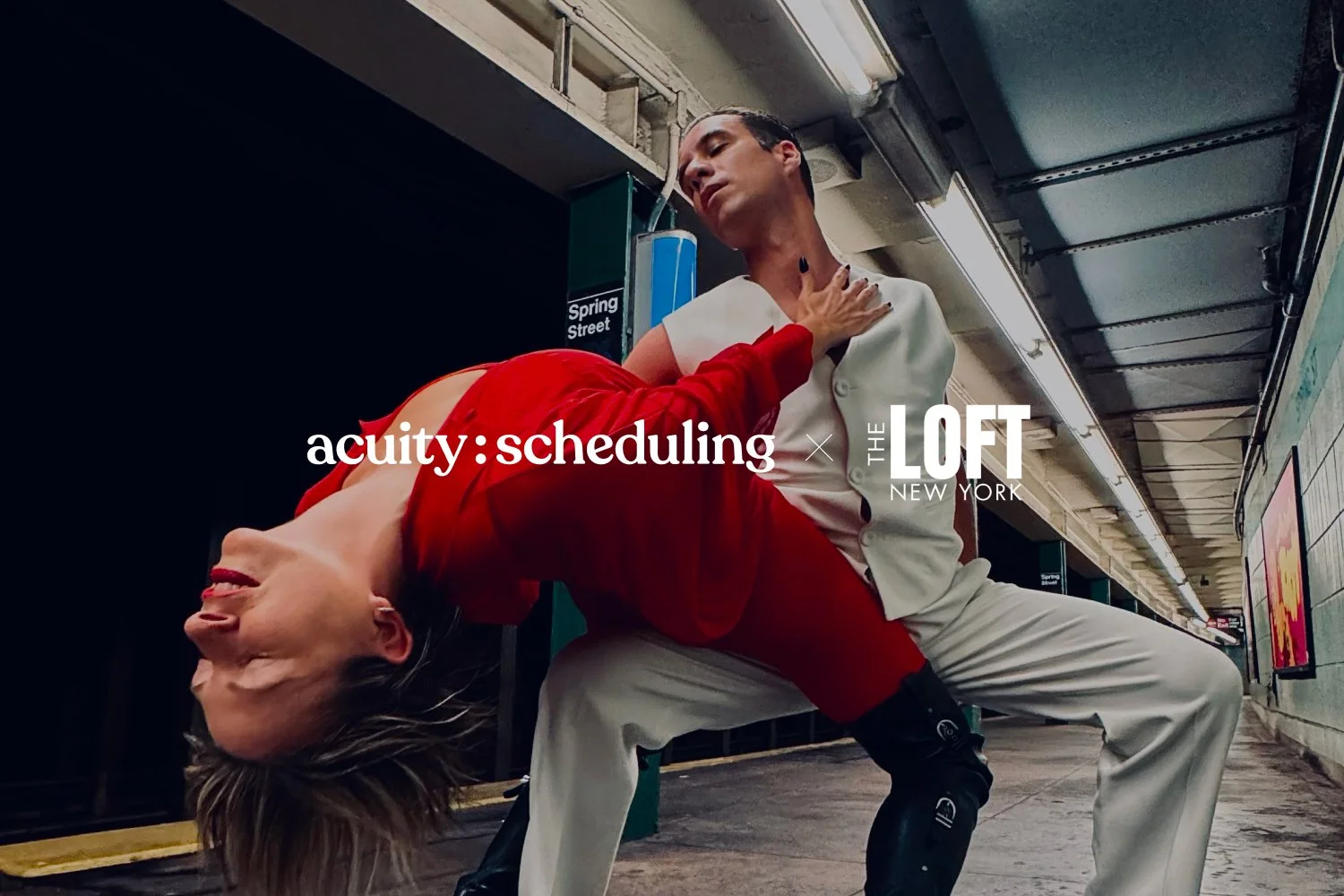 Two dancers from The LOFT perform in subway