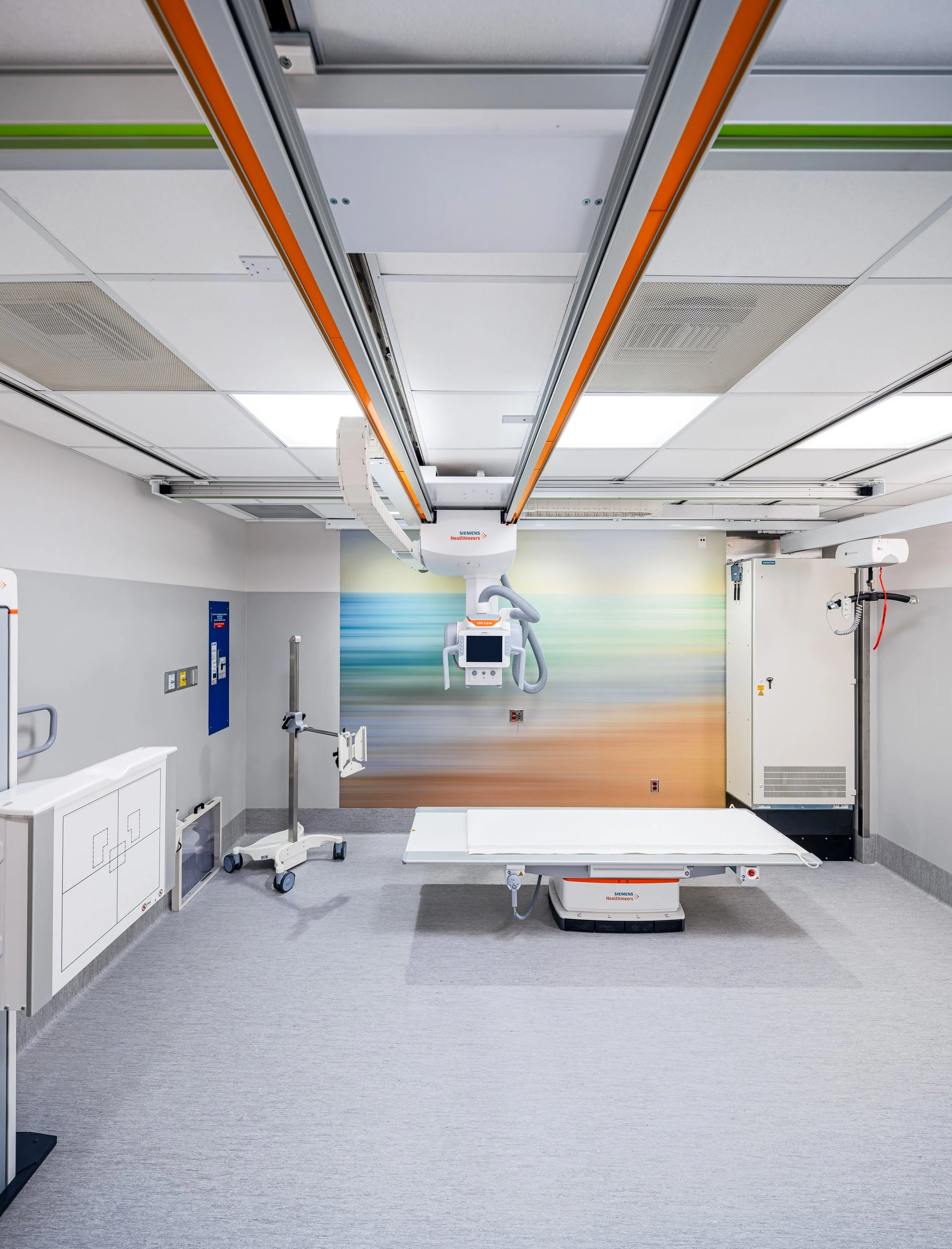 Close-up of interior finishes within the X-ray room, emphasizing durable, hygienic materials selected for a high-performance healthcare environment. Subtle color choices and smooth surfaces contribute to a sense of calm while meeting stringent hospit