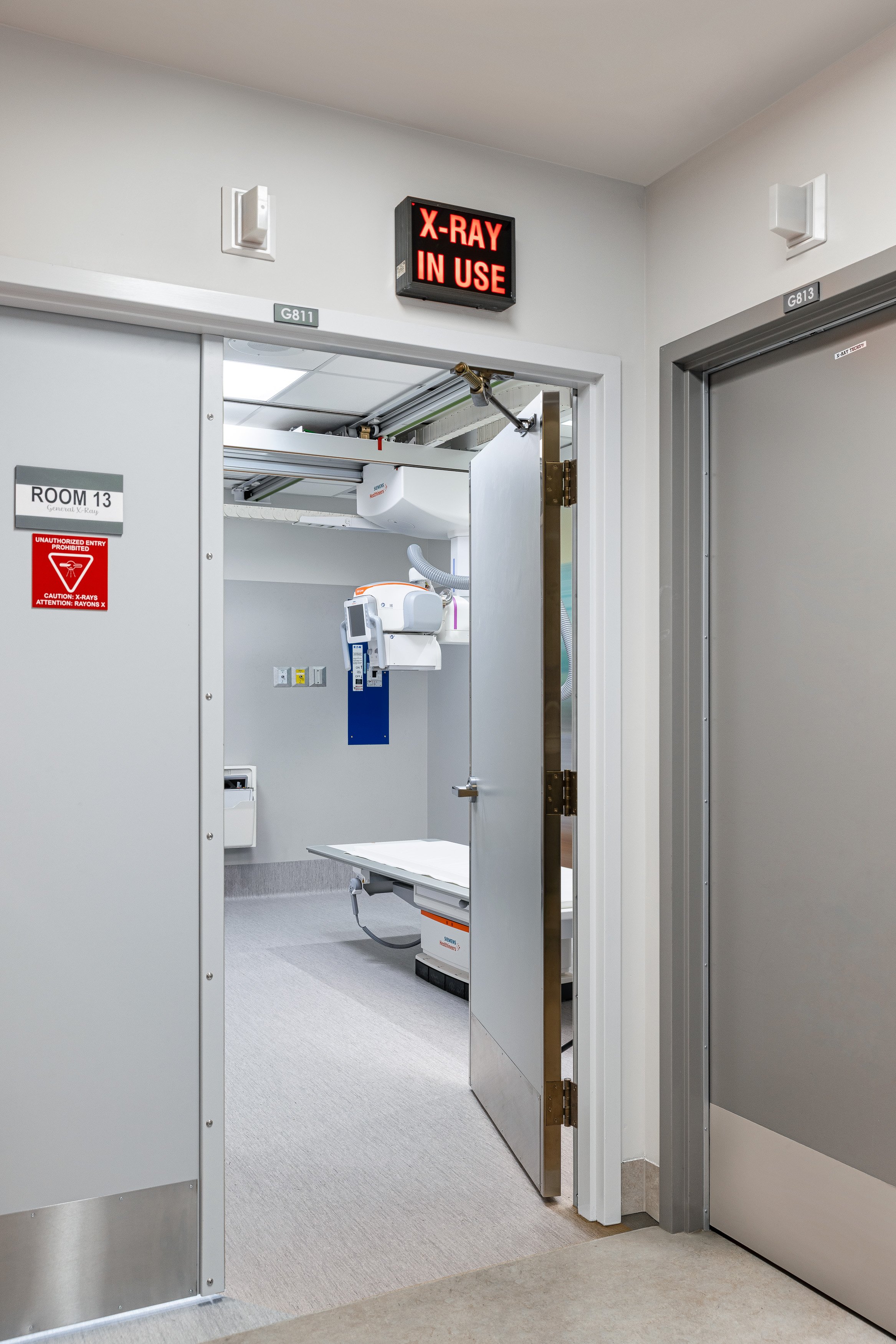 Patient-facing view of the imaging room, designed to feel approachable and reassuring. Balanced lighting, minimal visual clutter, and refined detailing demonstrate how functional medical spaces can also support patient comfort and wellbeing.