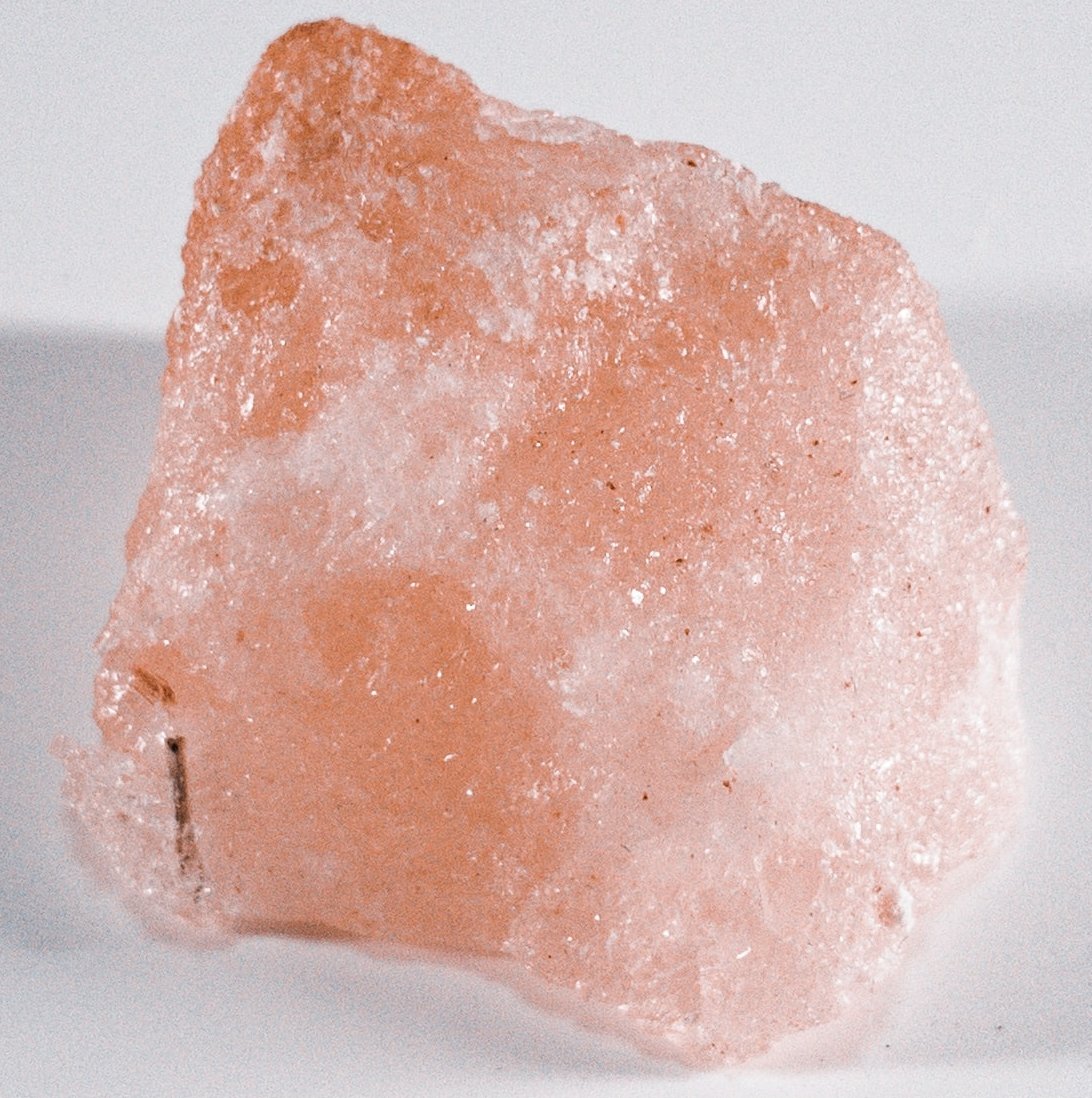 Our Sugar Plum Merlot Soy Candle includes Rose Quartz Gemstones inside and out