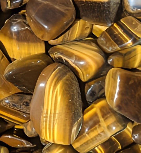 Our Cafe Brulee Soy Candle includes Tiger's Eye Gemstones inside and out