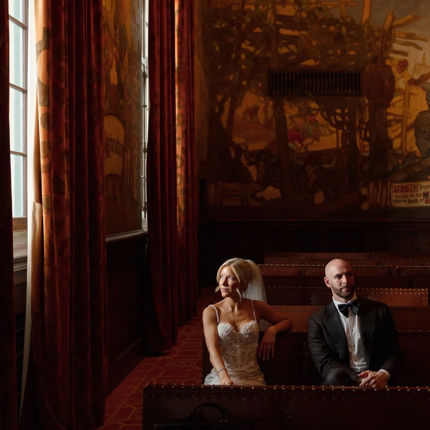 Sara and Gino becoming literal ART for me in the courthouse mural room 😍 my favorite is playing with romantic light and turning photographs into not only portraits of people but pieces of art that encapsulates so much emotion, texture and beauty. 

