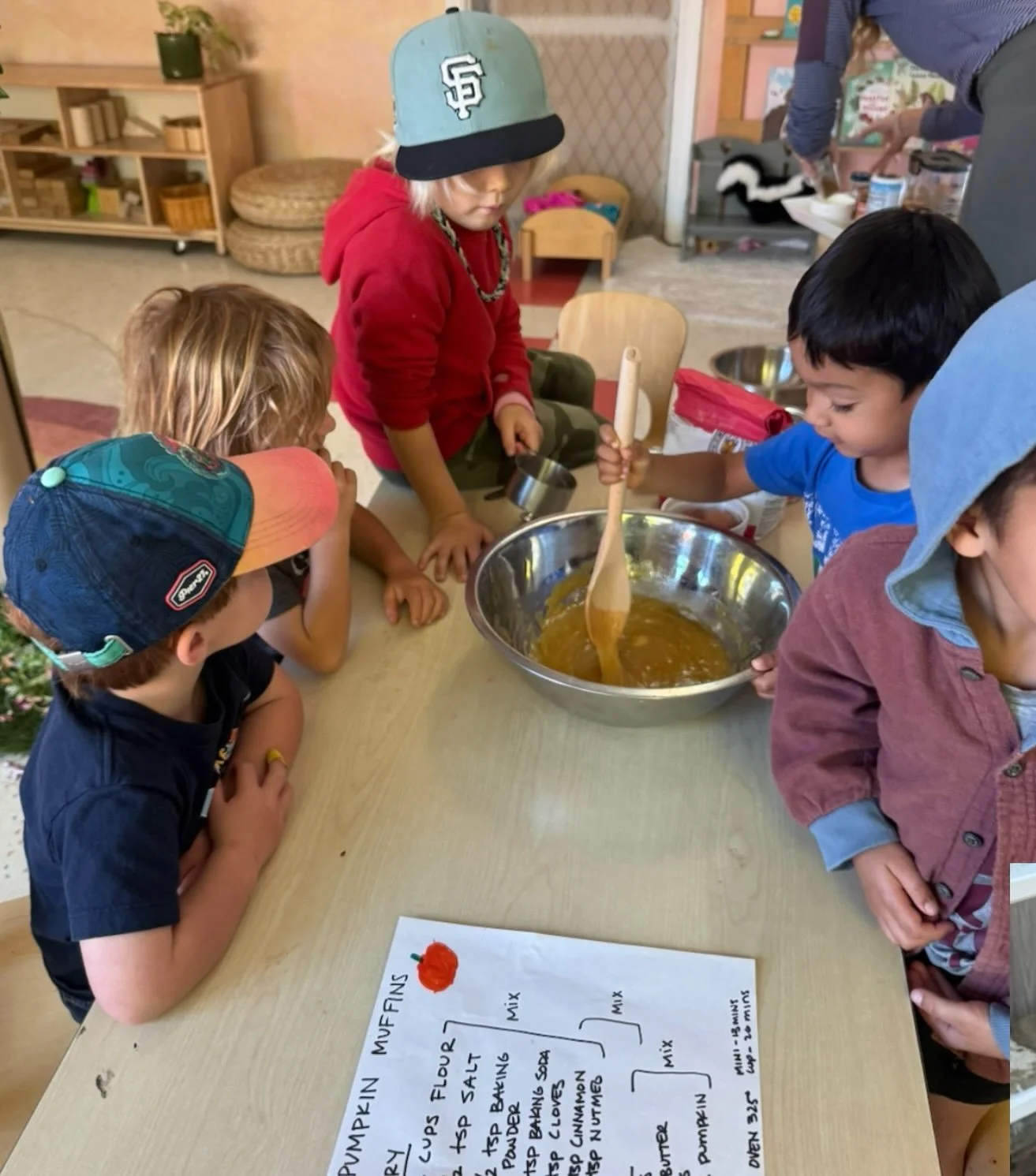 🍁Nothing says fall like pumpkin muffins! 🎃 The children had a blast measuring, pouring, and mixing ingredients to create a tasty seasonal treat. Hands-on learning has never been so delicious!