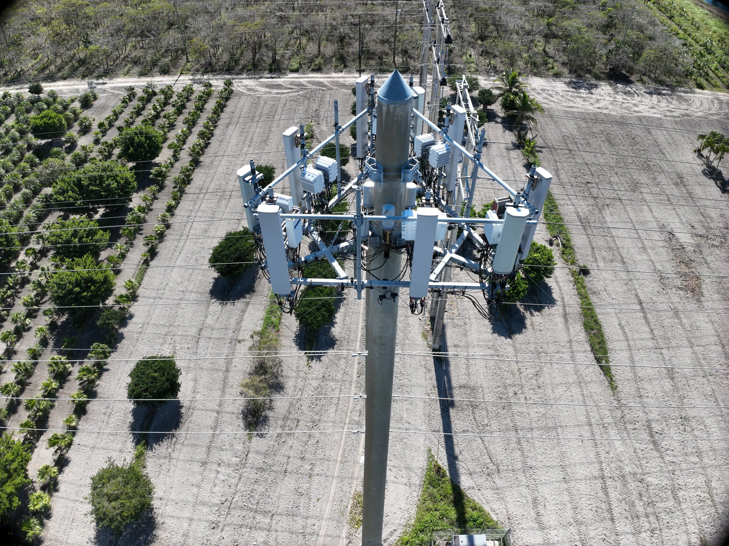 Downlook view of cell tower antenna array — aerial inspection by SAIRS Miami FAA certified