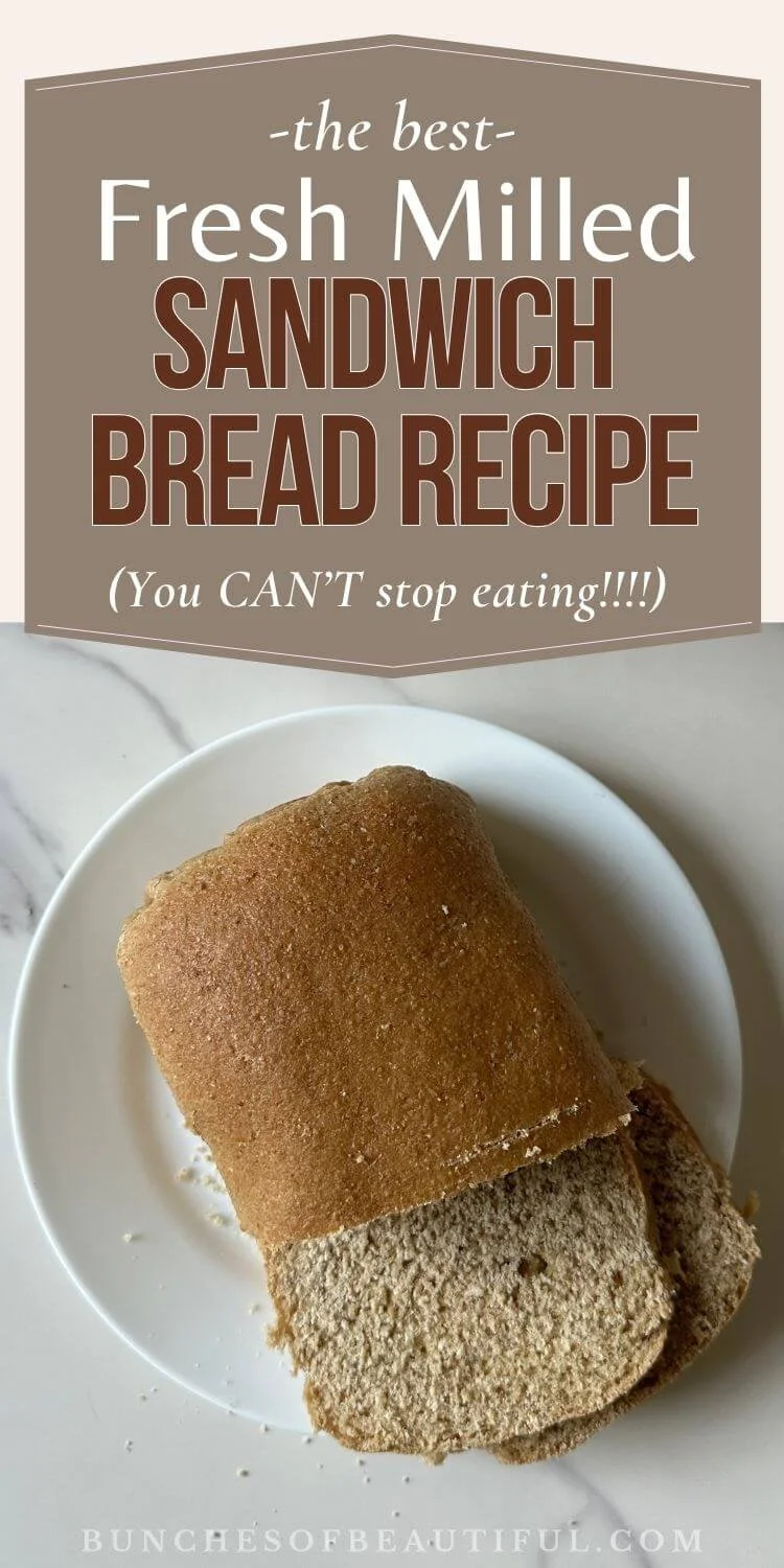 Fresh milled sandwich bread loaf on a white plate with text that reads Fresh Milled Sandwich Bread Recipe.