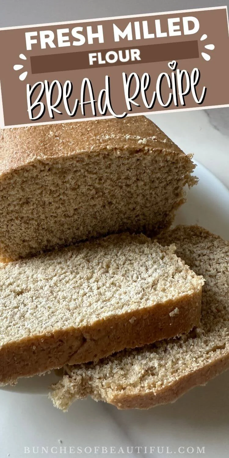 Sliced fresh milled flour bread on a plate with text that reads Fresh Milled Flour Bread Recipe.