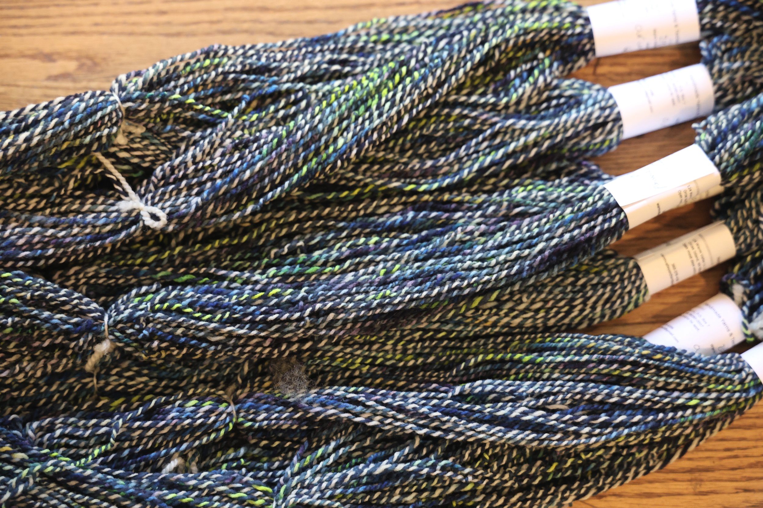 multicolored yarn a table