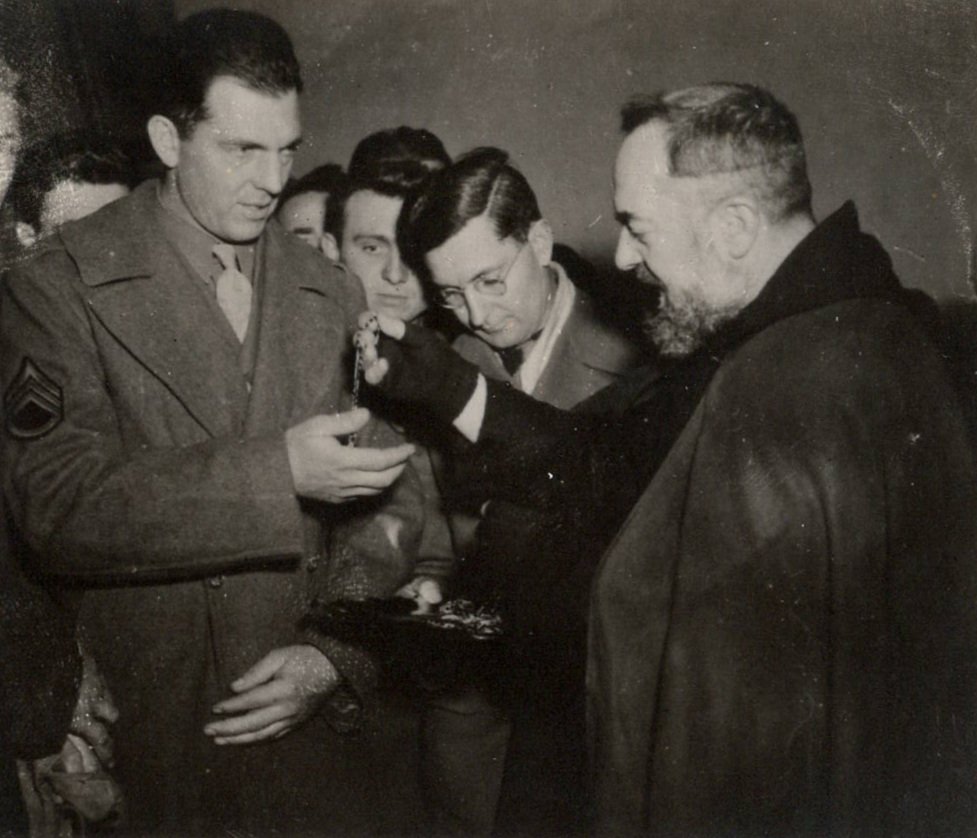 William Carrigan receiving blessed rosaries from Padre Pio (1944).