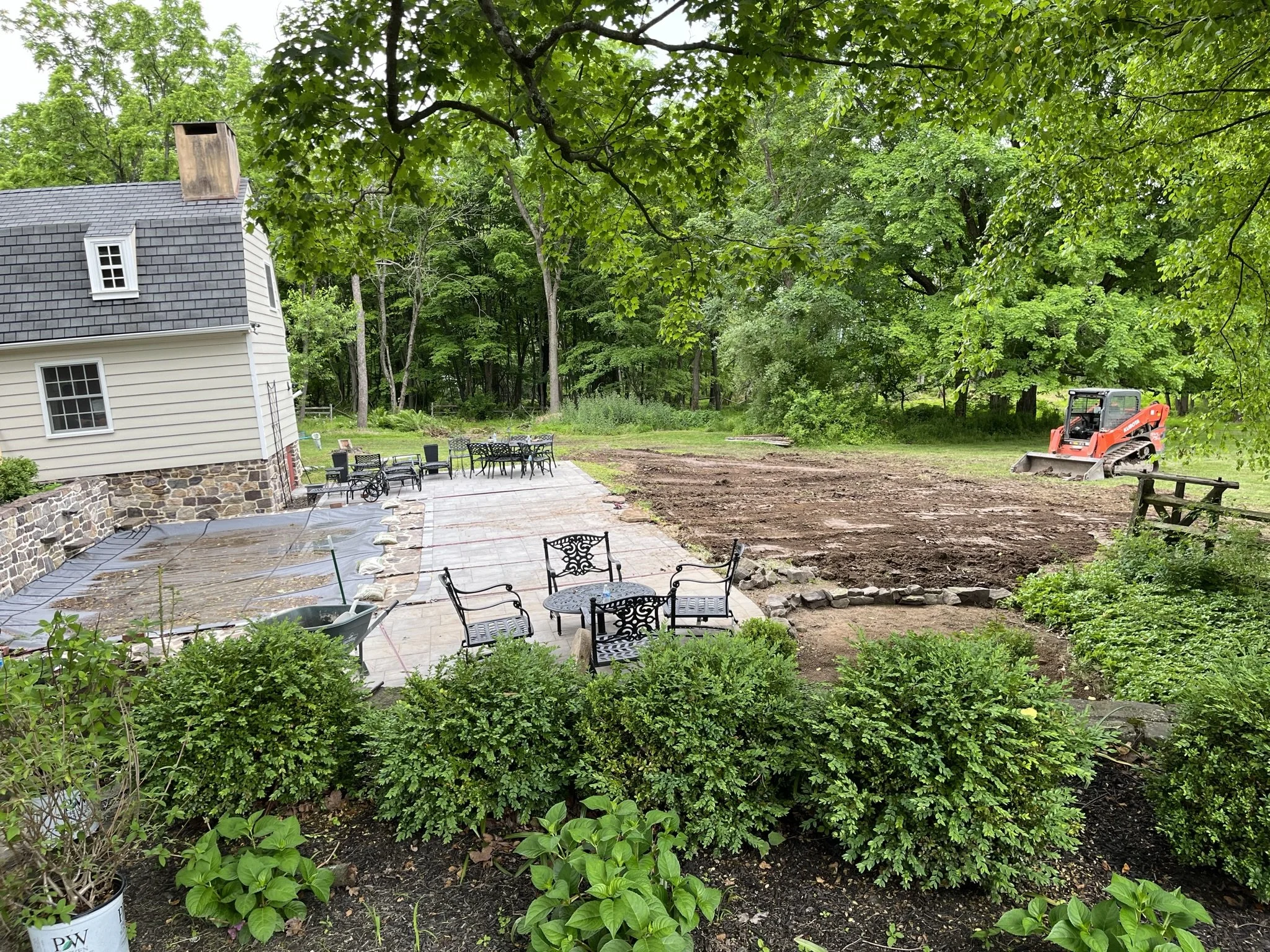 pool redo landscaping.jpeg