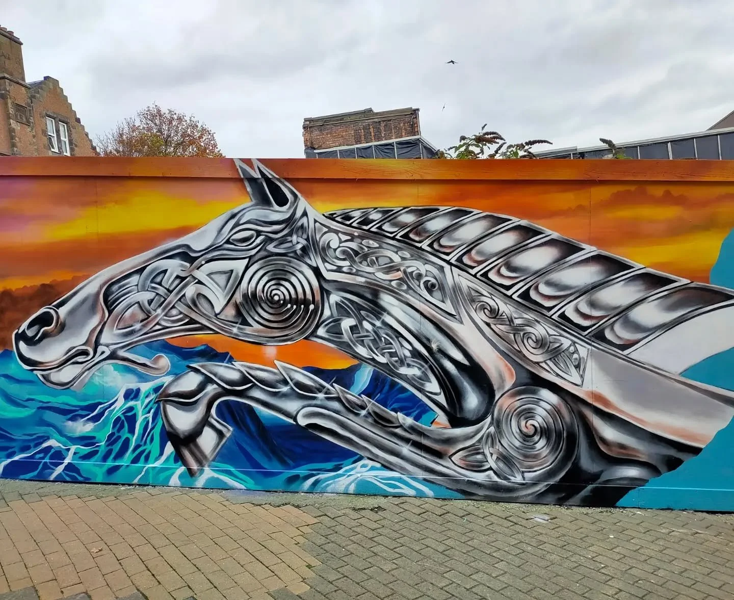 Been chipping away at this between jobs and dry days. Front of the Silver Pictish Kelpie done. Moving down the wall now. Too windy again today though, ladders, paint cans, tripod etc all blowing over, so called it a day after about an hour or two. It