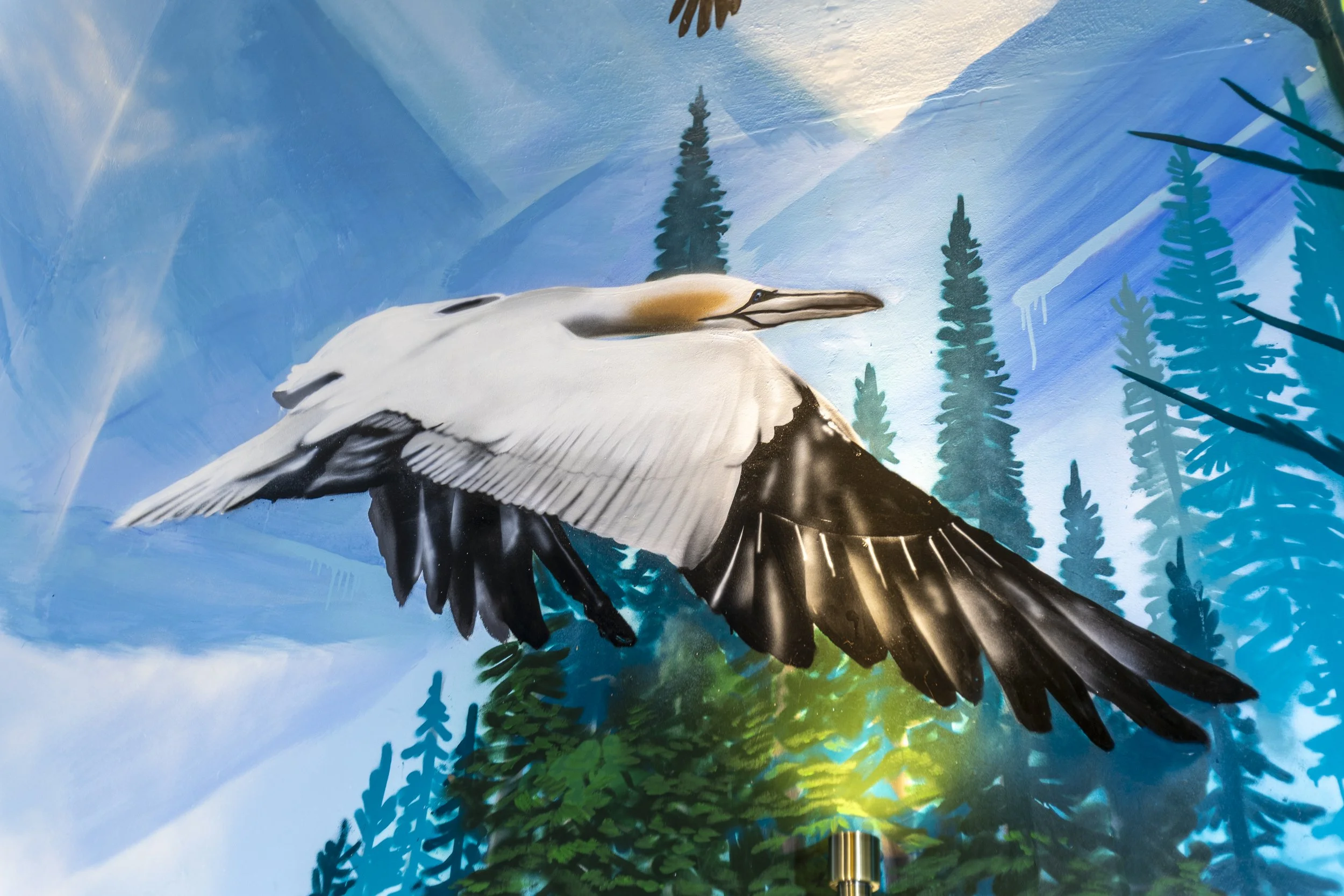 A stairwell mural in Bute featuring Scottish wildlife