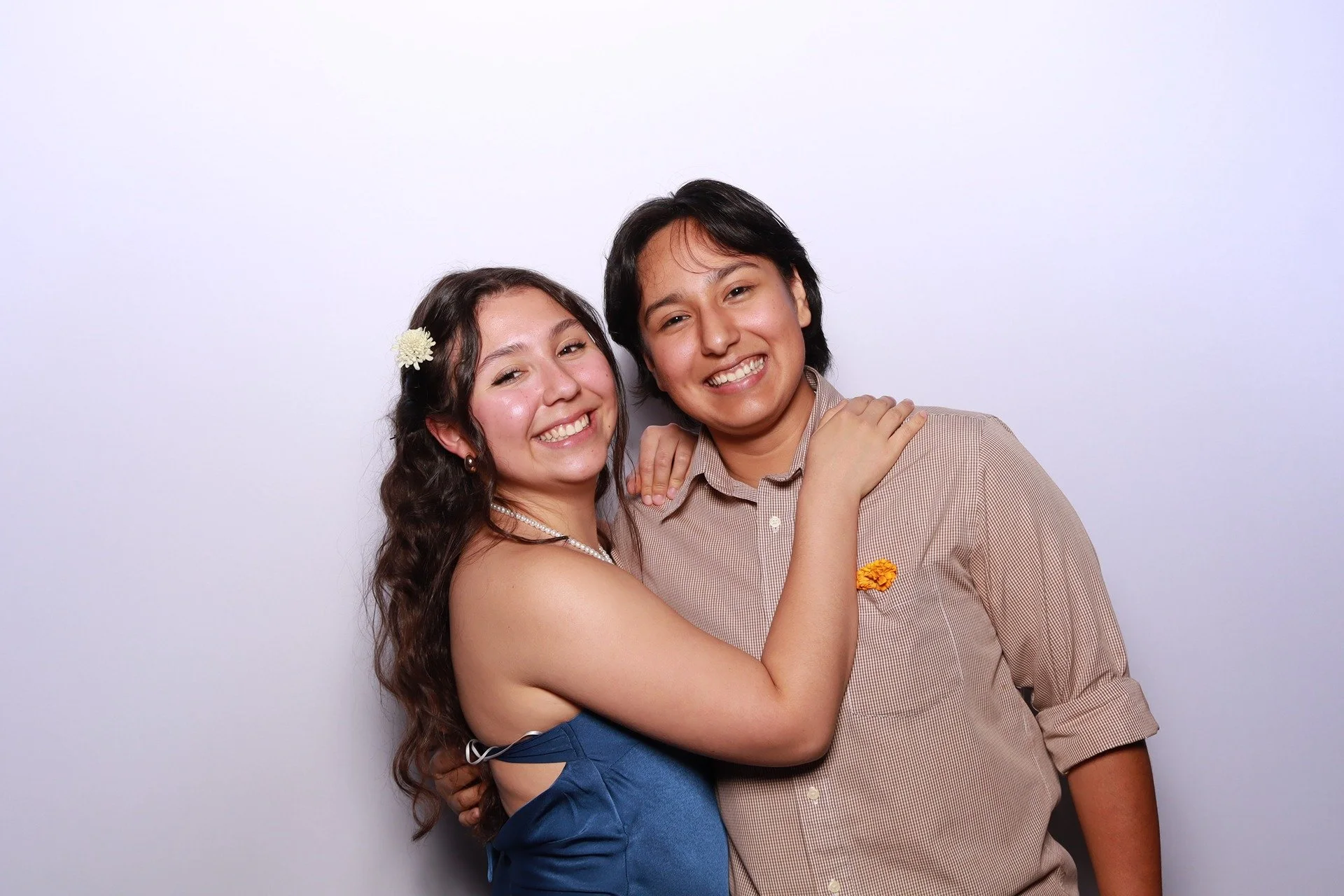 couple-hugging-portland-open-air-photobooth.jpg