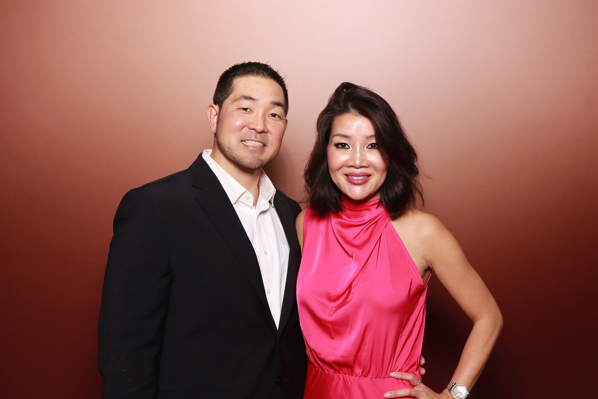  duo posing for photo booth picture during PACCO gala cocktail hour at the Nine Hotel in Portland. 