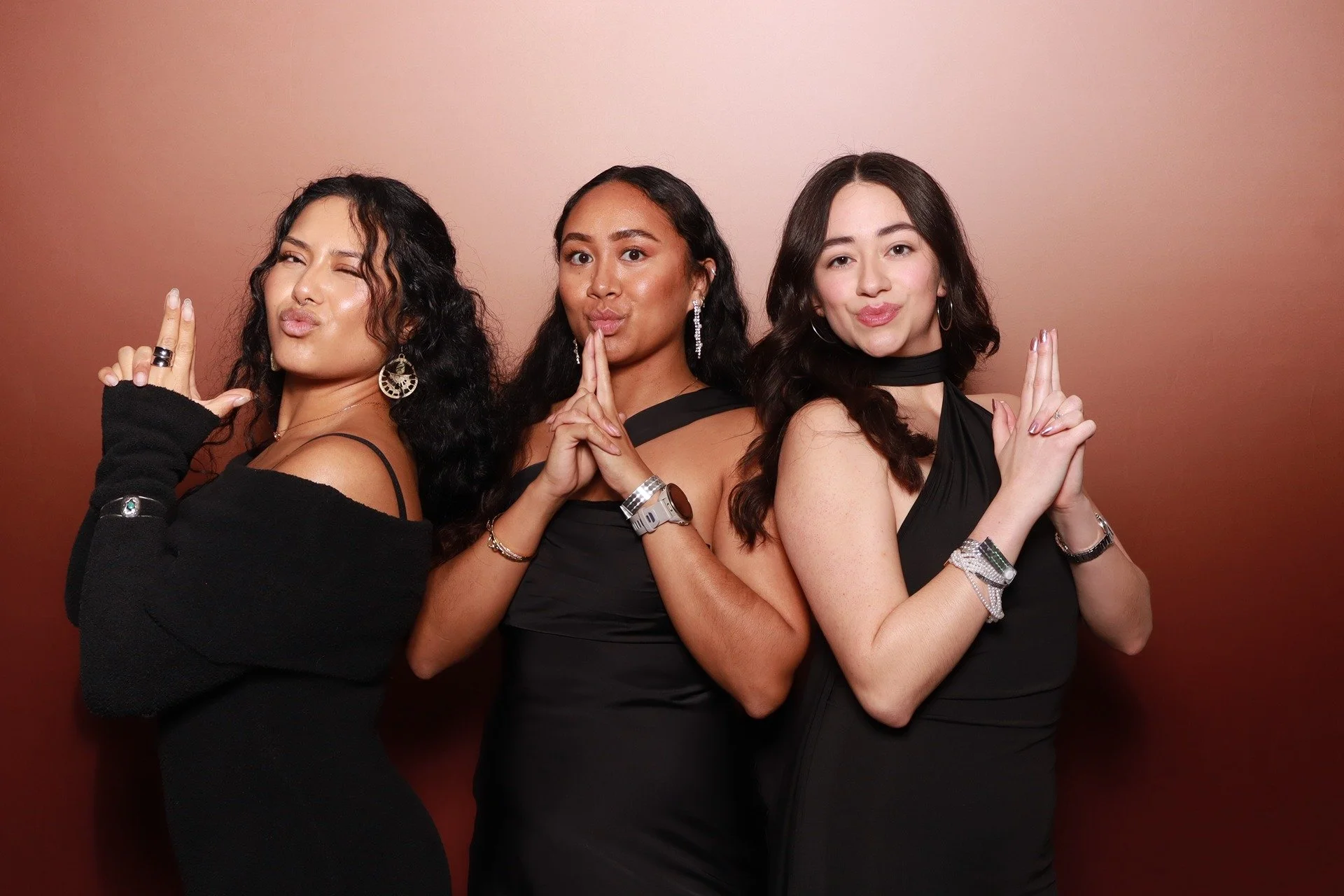  Friends capturing a memory at the PACCO Gala fundraising event photo booth 