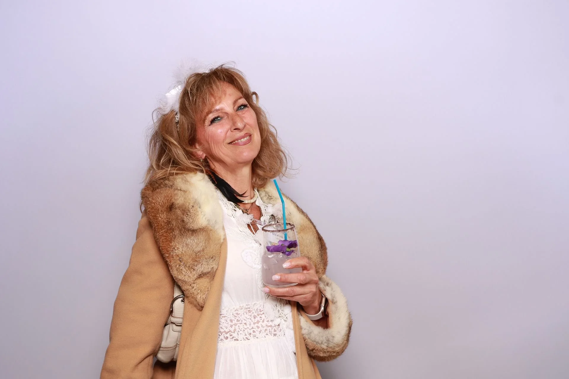 Guest enjoying the photo booth at a gala in Portland Oregon.
