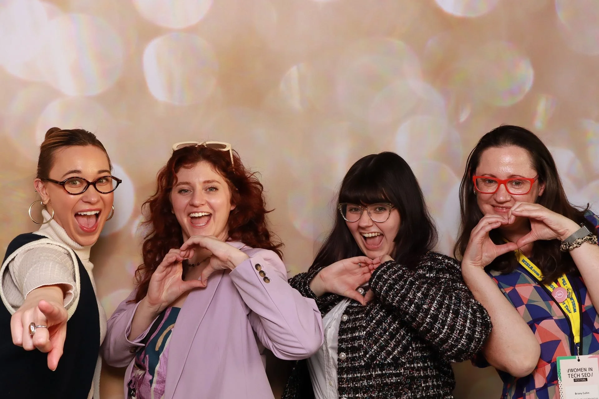 Friends posing for photo booth at Jupiter Next in Portland.