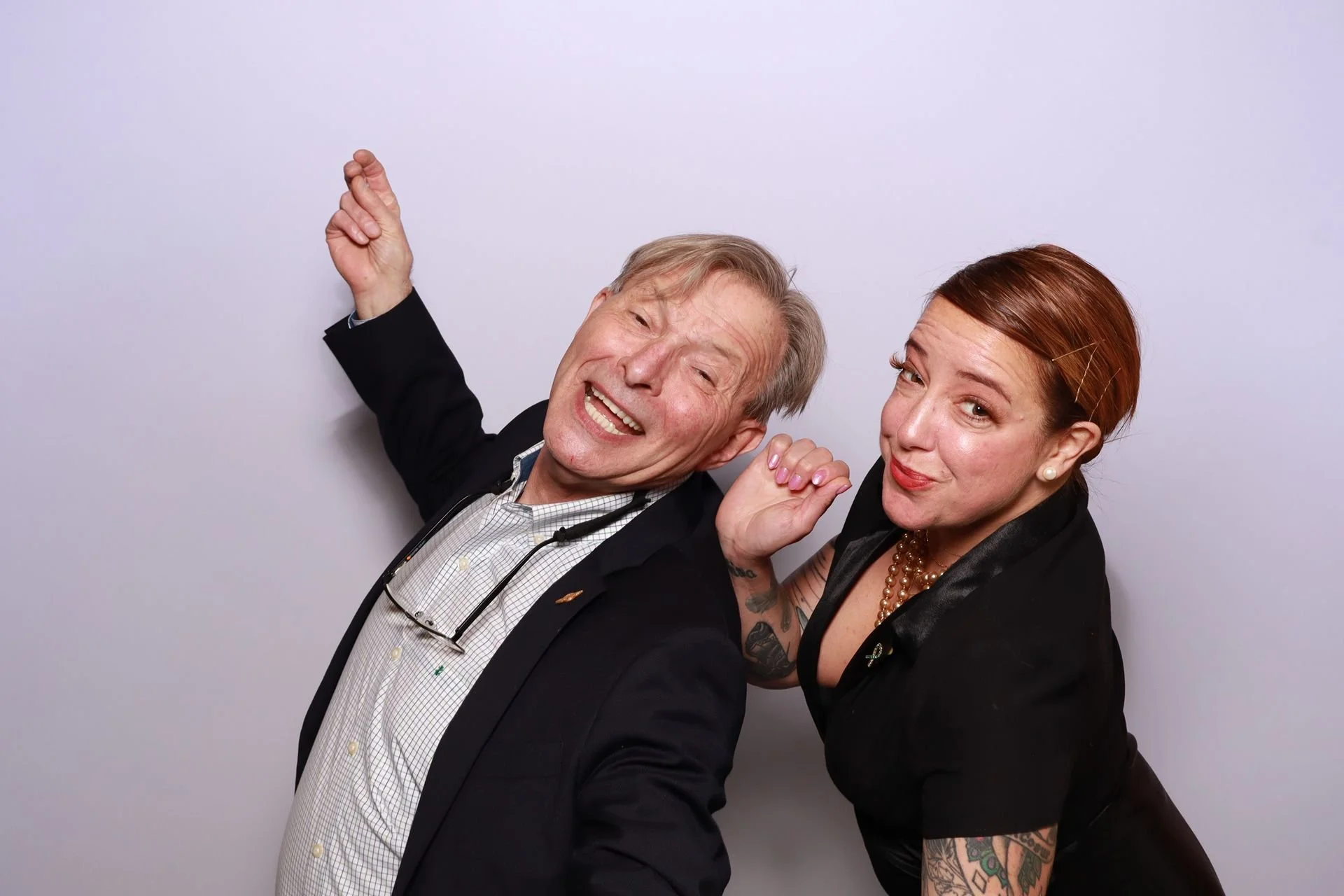 Friends enjoying photo booth at Redd East Event Space in Portland.