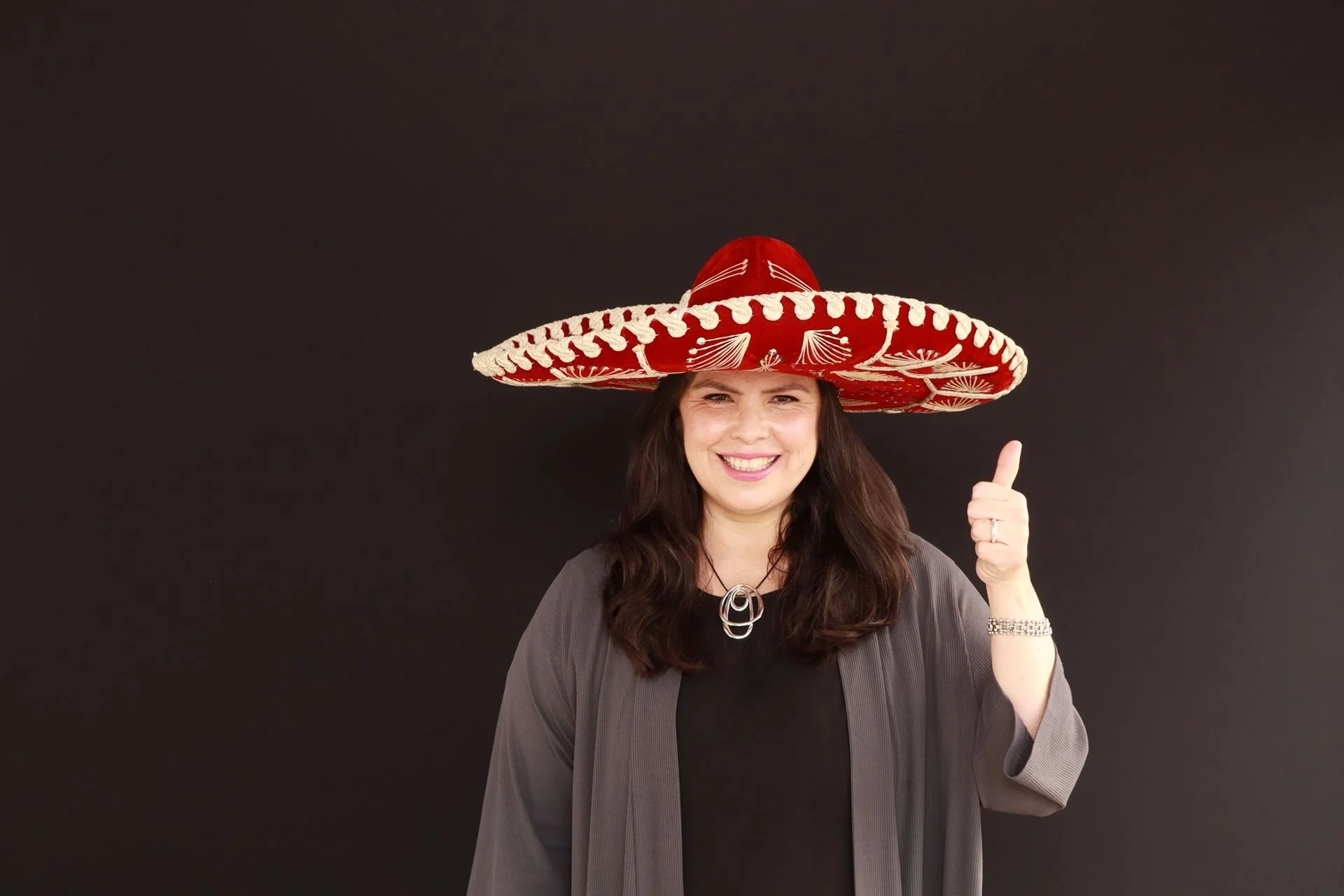 Guest posing for photo booth at El Festival de Mariachi in Hillsboro Oregon