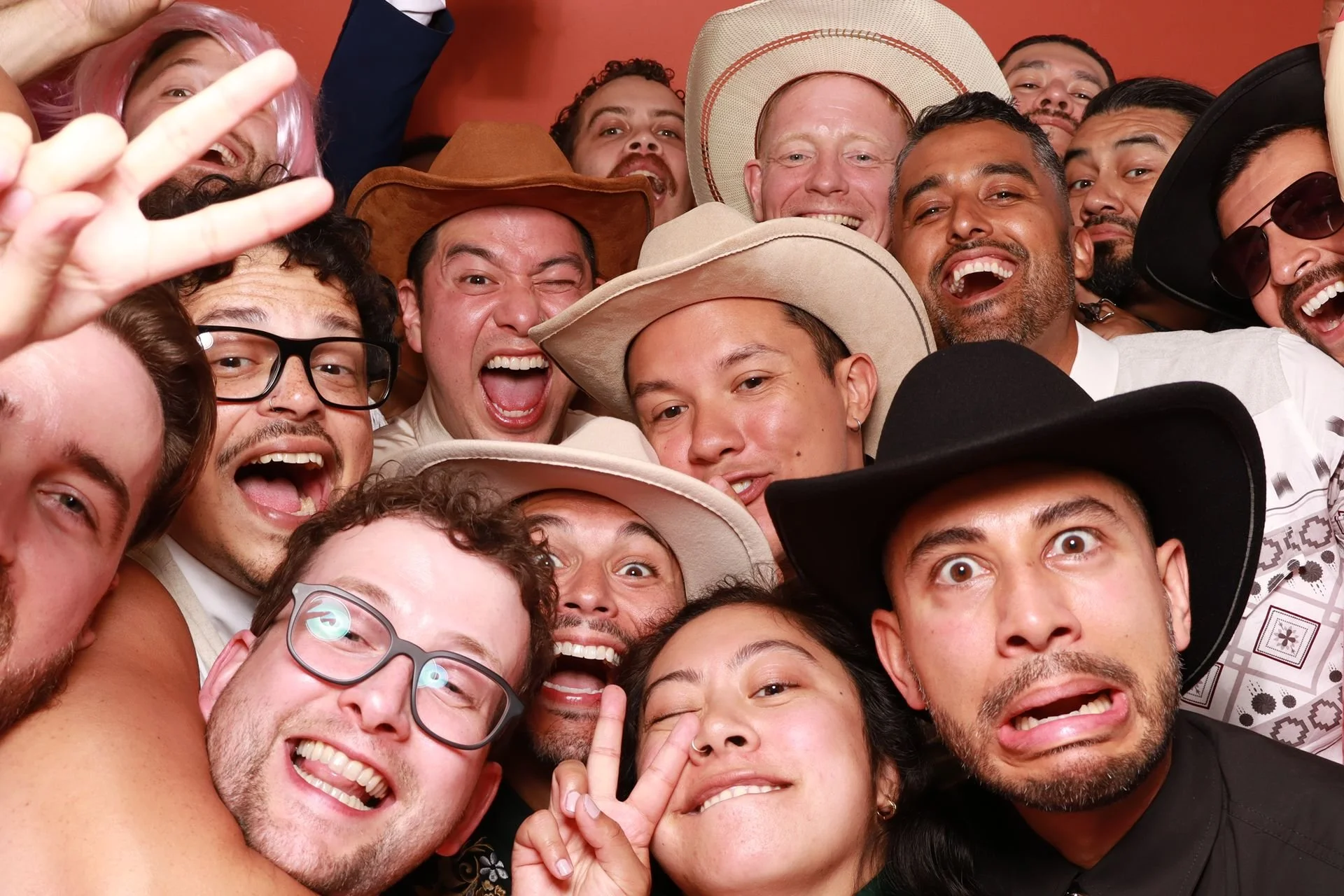 Wedding party group posing for a photobooth in Evergreen Events Mcminnville.
